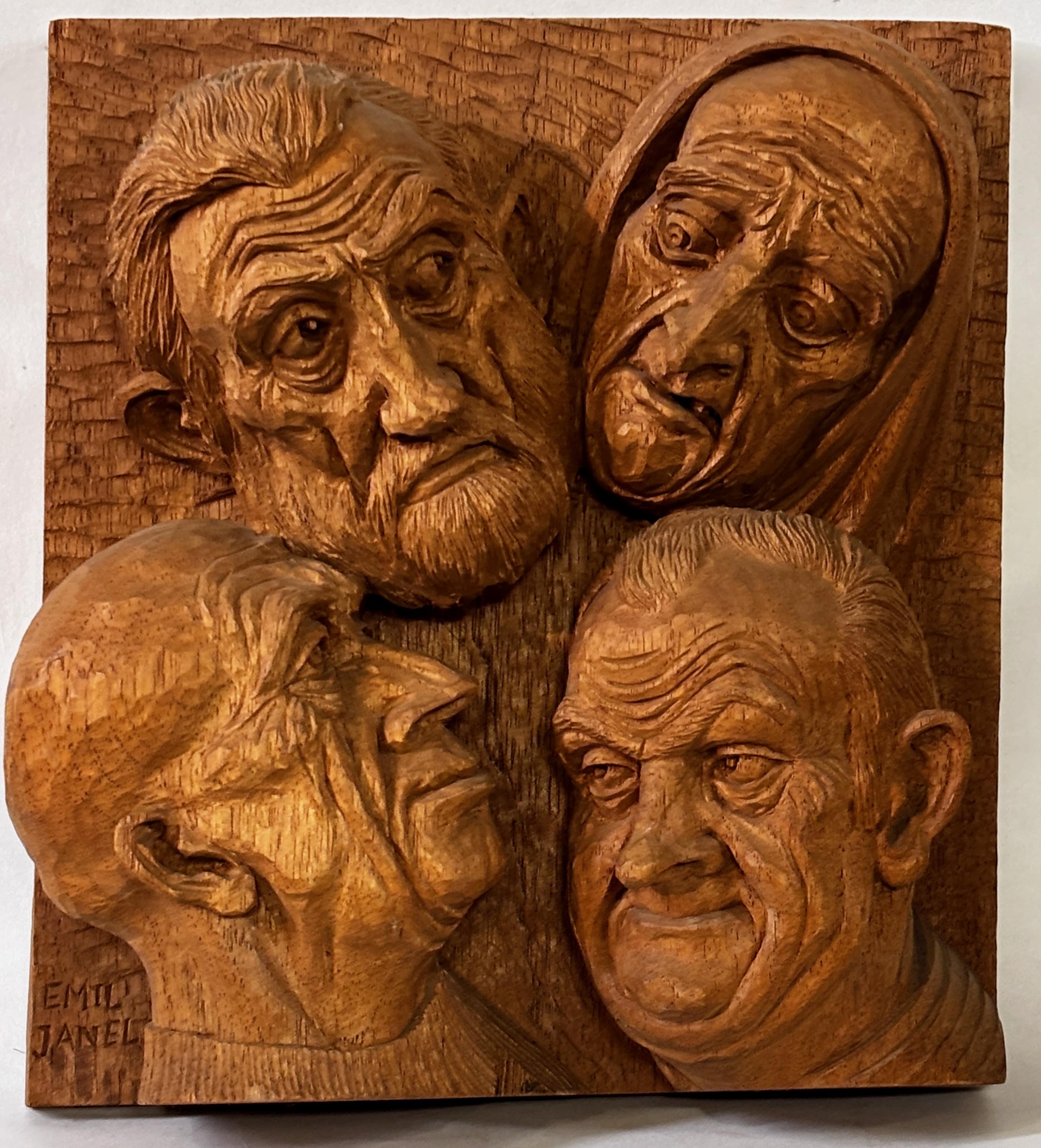 Full relief wood carving, signed Emil Janel.

Emil Janel was a Swedish-born, American artist. A still life painter, he is mainly known for his caricatures in the Scandinavian flat-plane style of woodcarving, and is considered by many to be one of