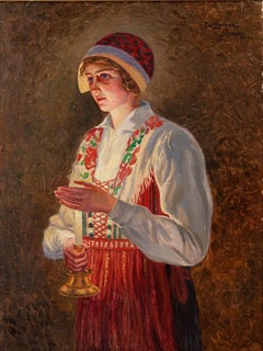 Mujer dalecarliana a la luz de las velas.