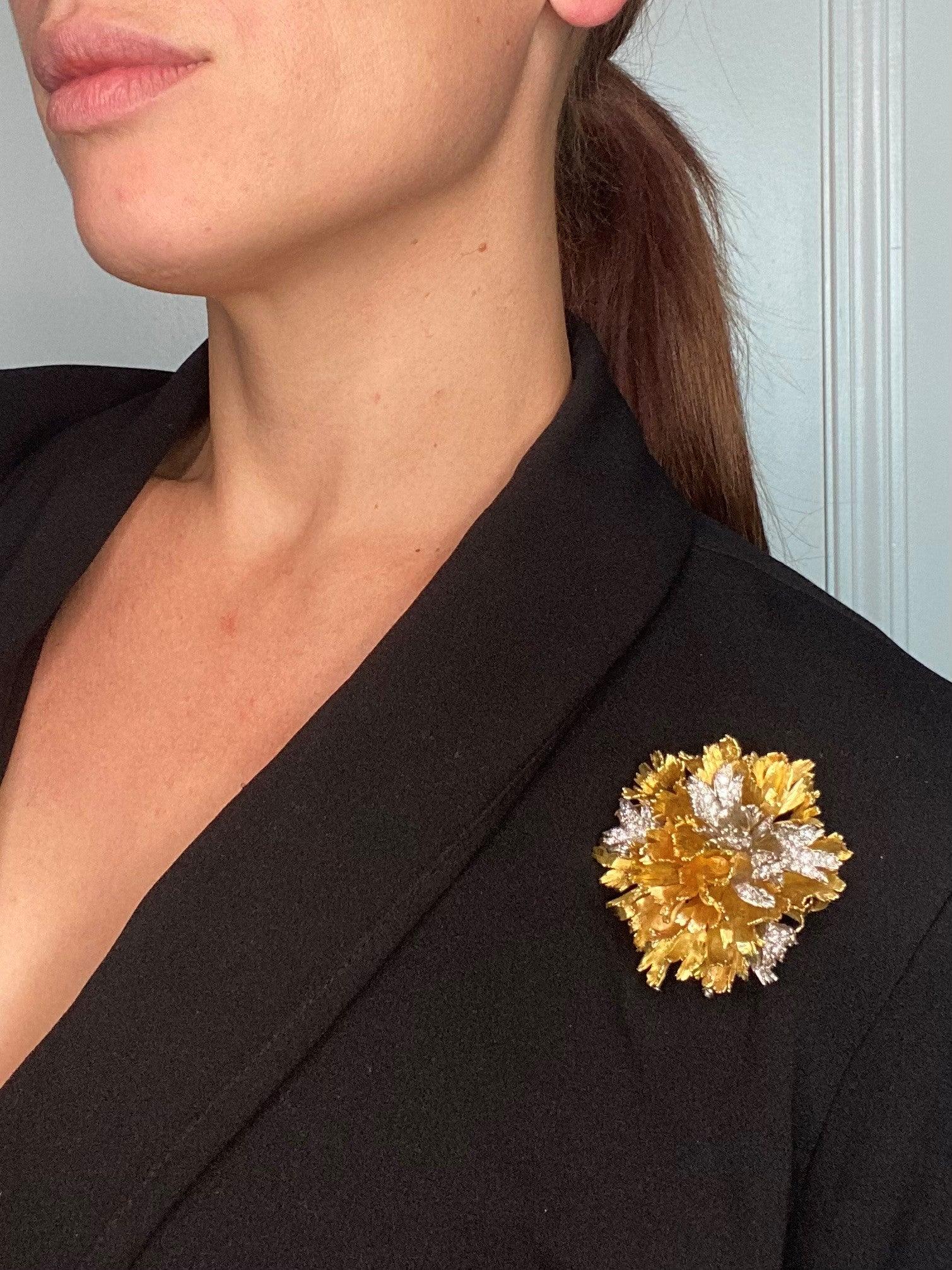 Convertible pendant-brooch designed by Emil Meister.

This is a fabulous three-dimensional pendant brooch, made in Zurich, Switzerland by the famous jeweler Emil Meister, between the 1950-1960. This pendant-brooch was designed as a carnation flower,
