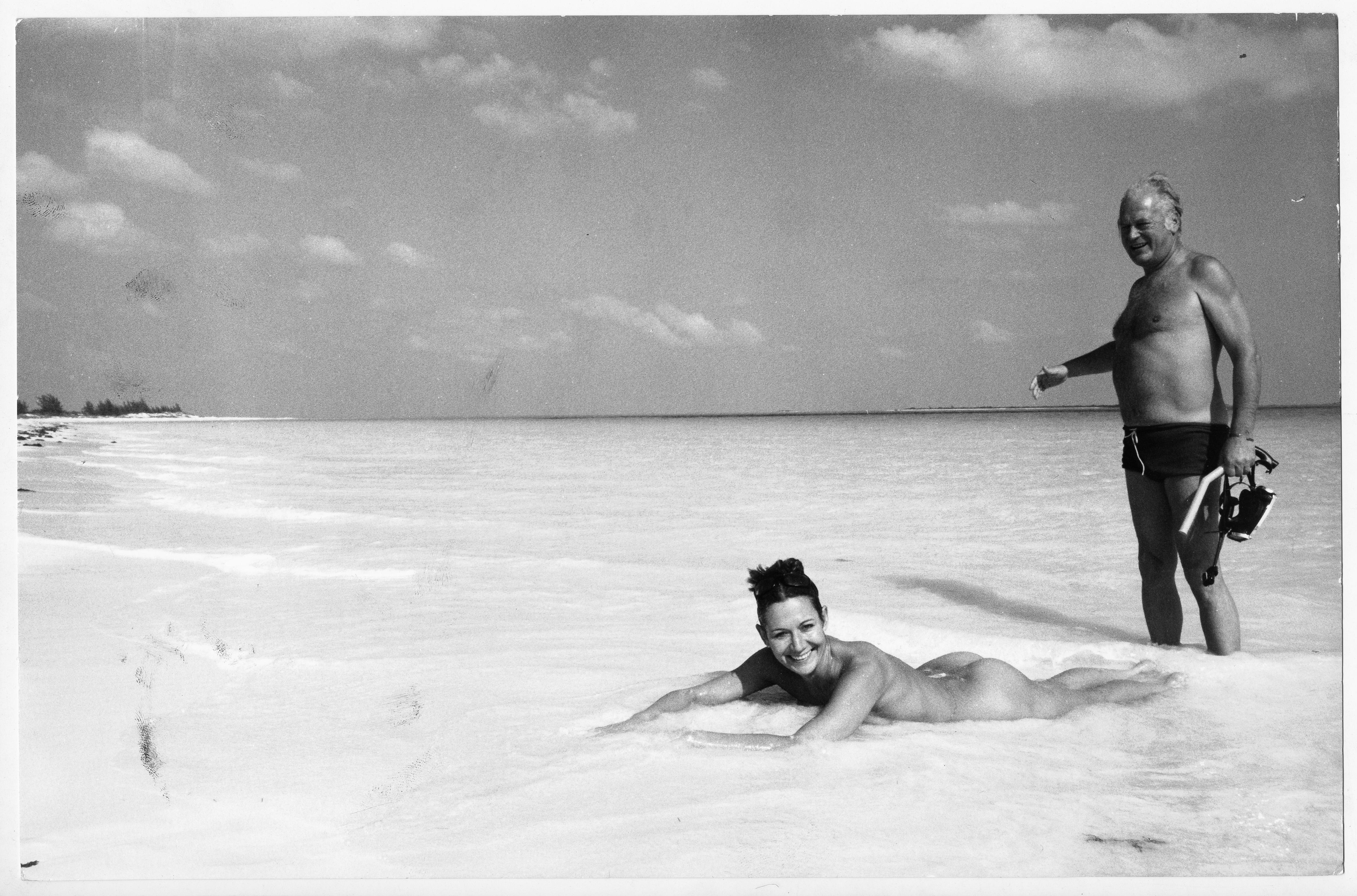 Emil Perauer Black and White Photograph - Bahamas - Curd Jürgens and Wife Simone (Bicheron) on the beach, circa 1971.
