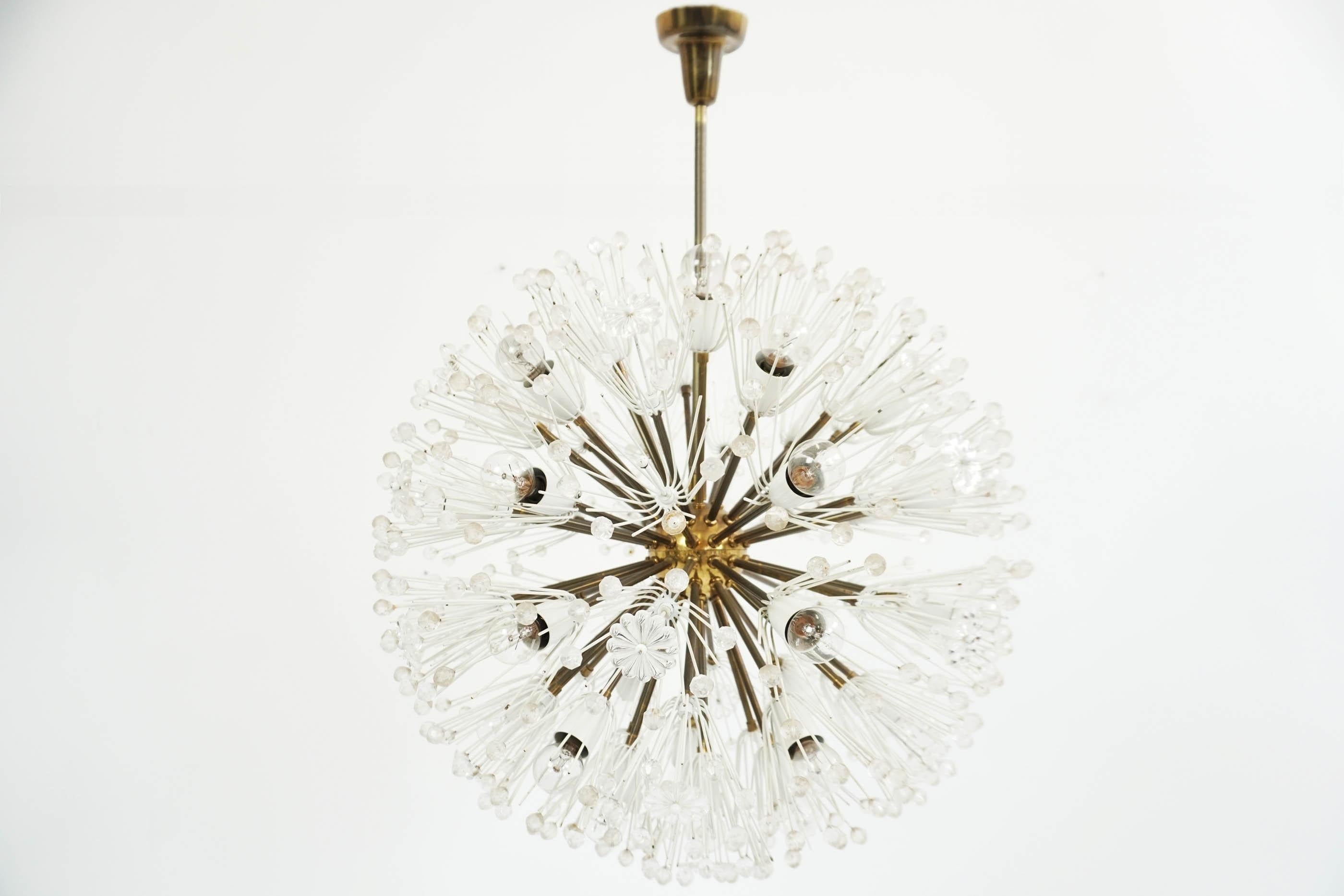 Fabulous brass and ceselled crystal Sputnik chandelier made in Austria 1955
Designed by Emil Stejnar and produced by Rupert Nikoll.
 
