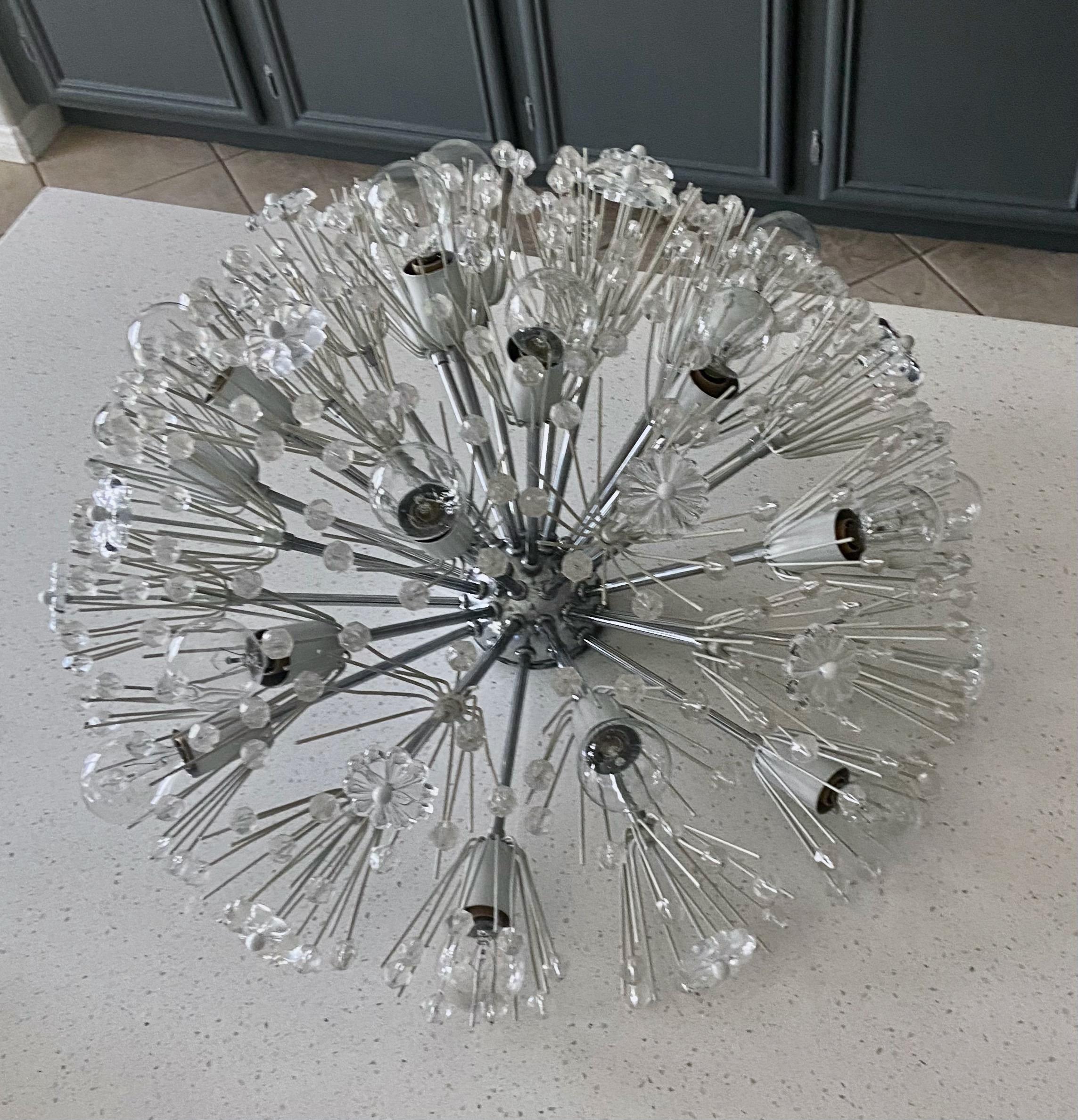 Large Emil Stejnar snowball (or dandelion) chrome frame flush mount ceiling light. Constructed of white painted florets and socket covers accented with clear beads and glass flowers. Sixteen light sockets each uses candelabra base bulbs. Newly