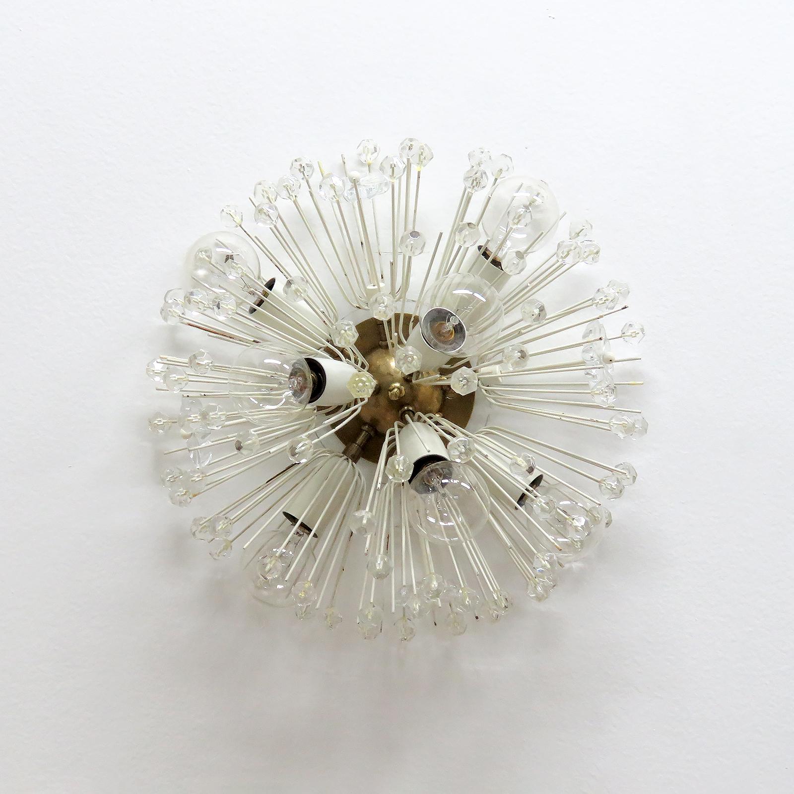 Beautiful and delicate 7-light brass fixture with copious amounts of Austrian crystals by Emil Stejnar for Nikoll, can be wall or ceiling mounted, wired for US standards, seven E14 sockets, max. wattage 25w each or LED equivalent, bulbs provided as
