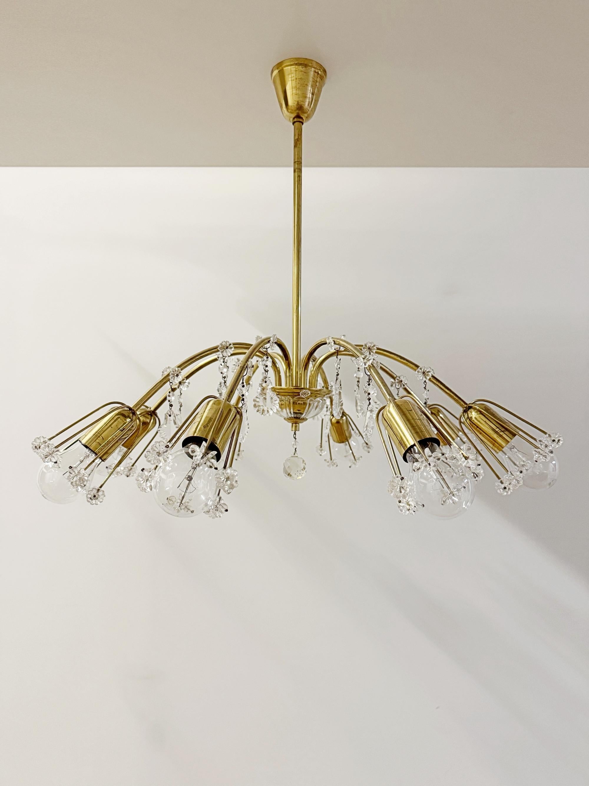 Beautiful Mid-Century Modern ceiling light, manufactured by Rupert Nikoll in 1960's, Austria, Vienna. This chandelier is a striking appearance in every room. Elegant shape and high quality
workmanship with lovely patina. The light is made polished
