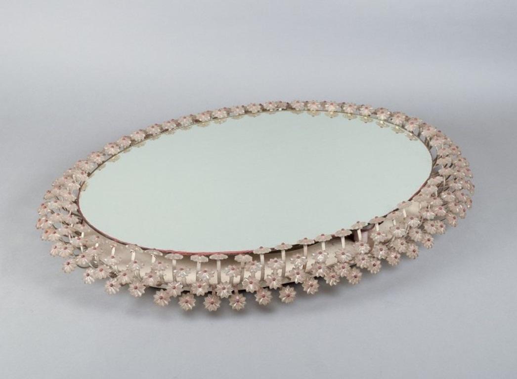 Emil Stejnar for Rupert Nikoll. Illuminated mirror surrounded by acrylic plastic flowers with steel stems.
Mid-20th century.
In excellent condition with minor signs of use.
Mirror plate dimensions: 67.0 cm x 48.0 cm.
Dimensions: H 81.0 cm x 61.0 cm
