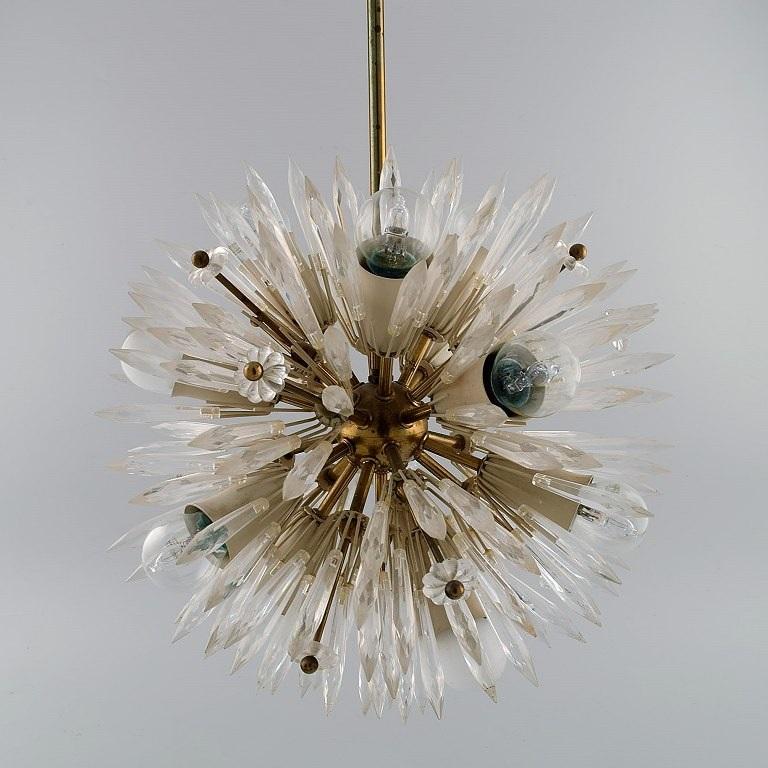 Emil Stejnar for Rupert Nikoll. 
Impressive ceiling lamp in brass and art glass shaped like crystals and flowers. 
Mid-20th century.
Measures: 35 x 35 cm.
Total height: 65 cm.
In excellent condition.