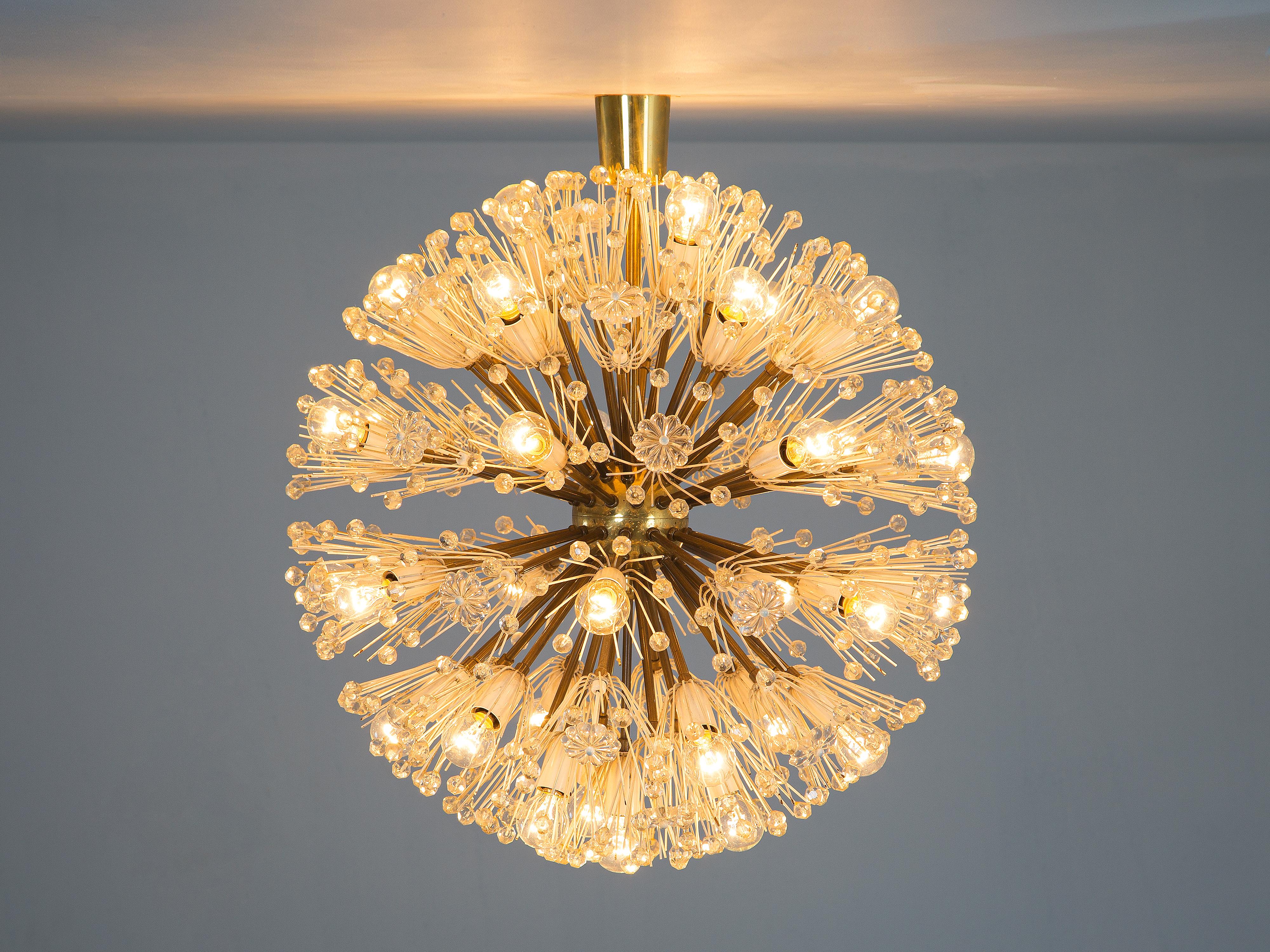 Emil Stejnar for Rupert Nikoll, Sputnik chandelier, brass, glass, Austria, 1960s 

Very rare large pendant light by Emil Stejnar. Round like a ball this 'Sputnik' chandelier consists out of a center sphere from which many rods with glass spheres at