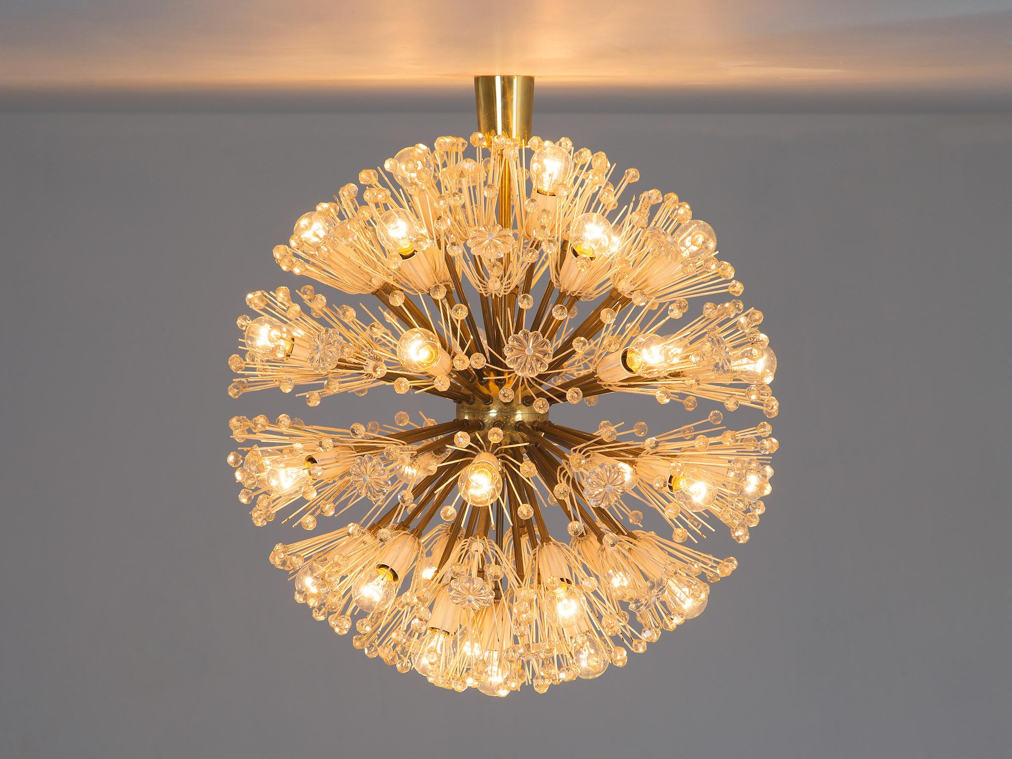 Emil Stejnar for Rupert Nikoll, Sputnik chandelier, brass, glass, Austria, 1960s 

Very rare large pendant light by Emil Stejnar. Round like a ball this 'Sputnik' chandelier consists of a center sphere from which many rods with glass spheres at
