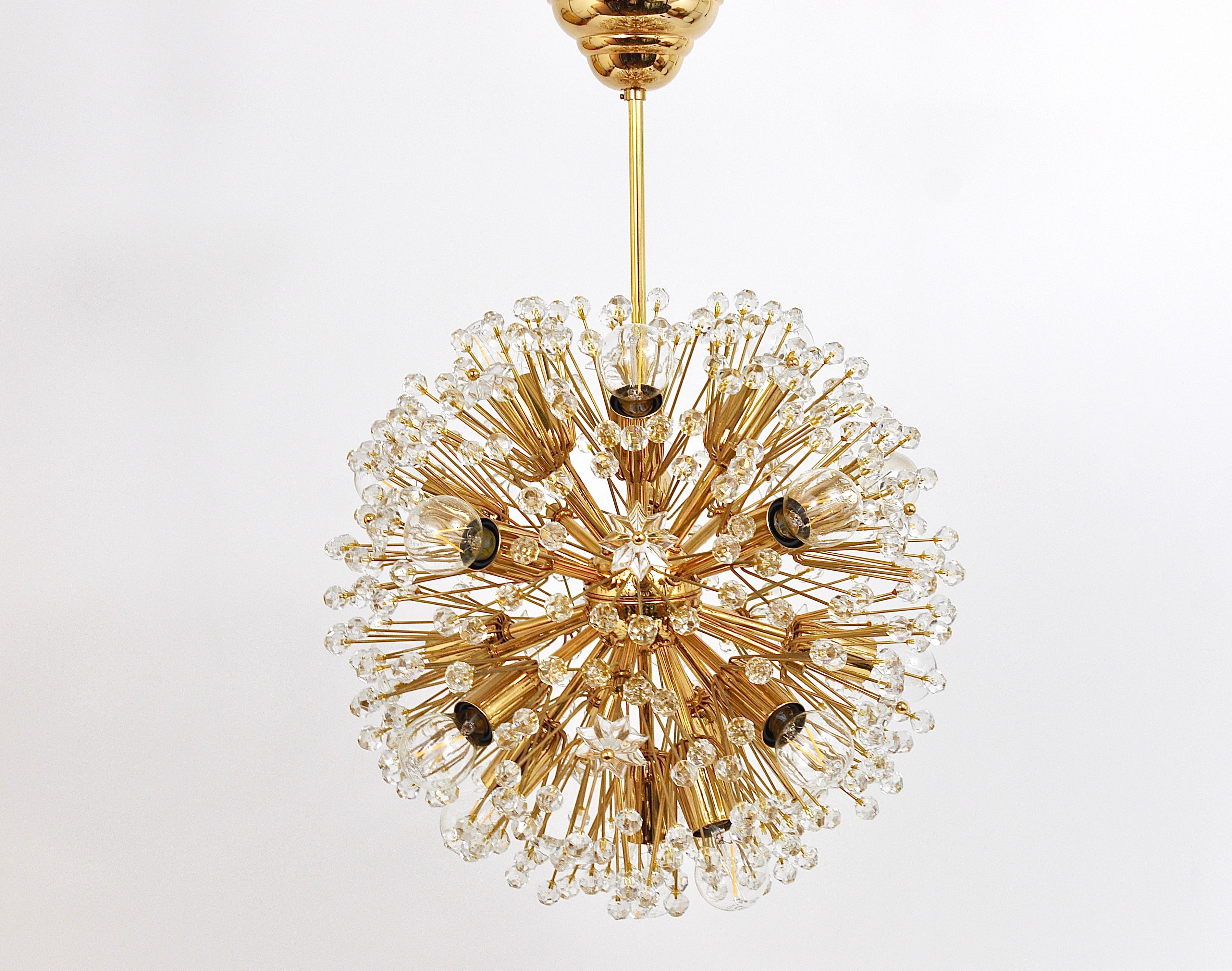 Beautiful golden snowflake blowball sputnik chandelier. Exclusive 24 carat gold-plated model, made in Vienna / Austria in the 1970s, in the manner of Emil Stejnar / Rupert Nikoll. This chandelier has a diameter of 15 in, its total height incl. rod