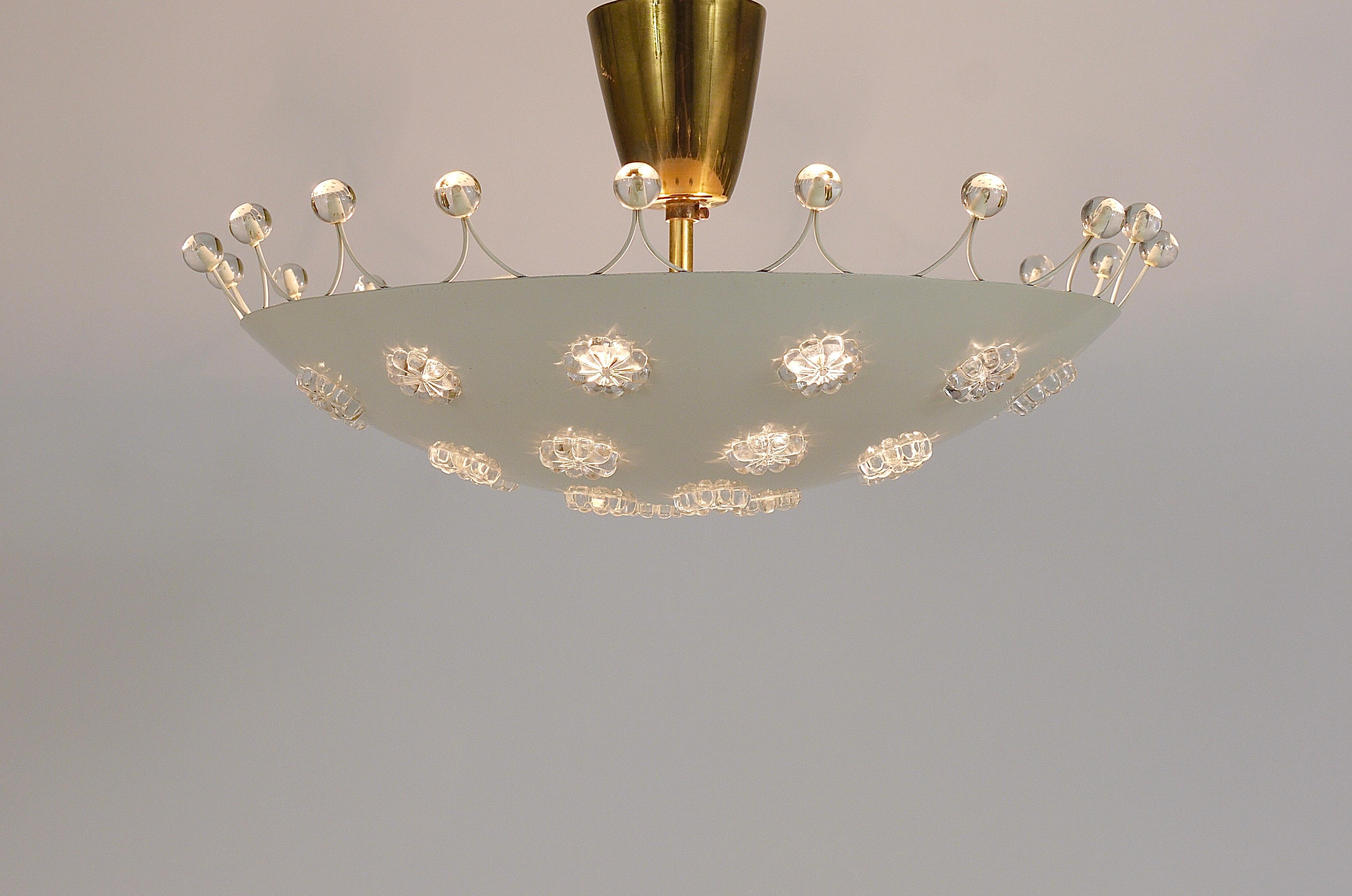 A charming white brass bowl ceiling lamp / uplight / plafoniere from the 1950s, designed by Emil Stejnar, executed by Rupert Nikoll, Vienna / Austria. Consists of a dome-shaped white bowl on a brass stem and canopy. Covered with crystal glass flower