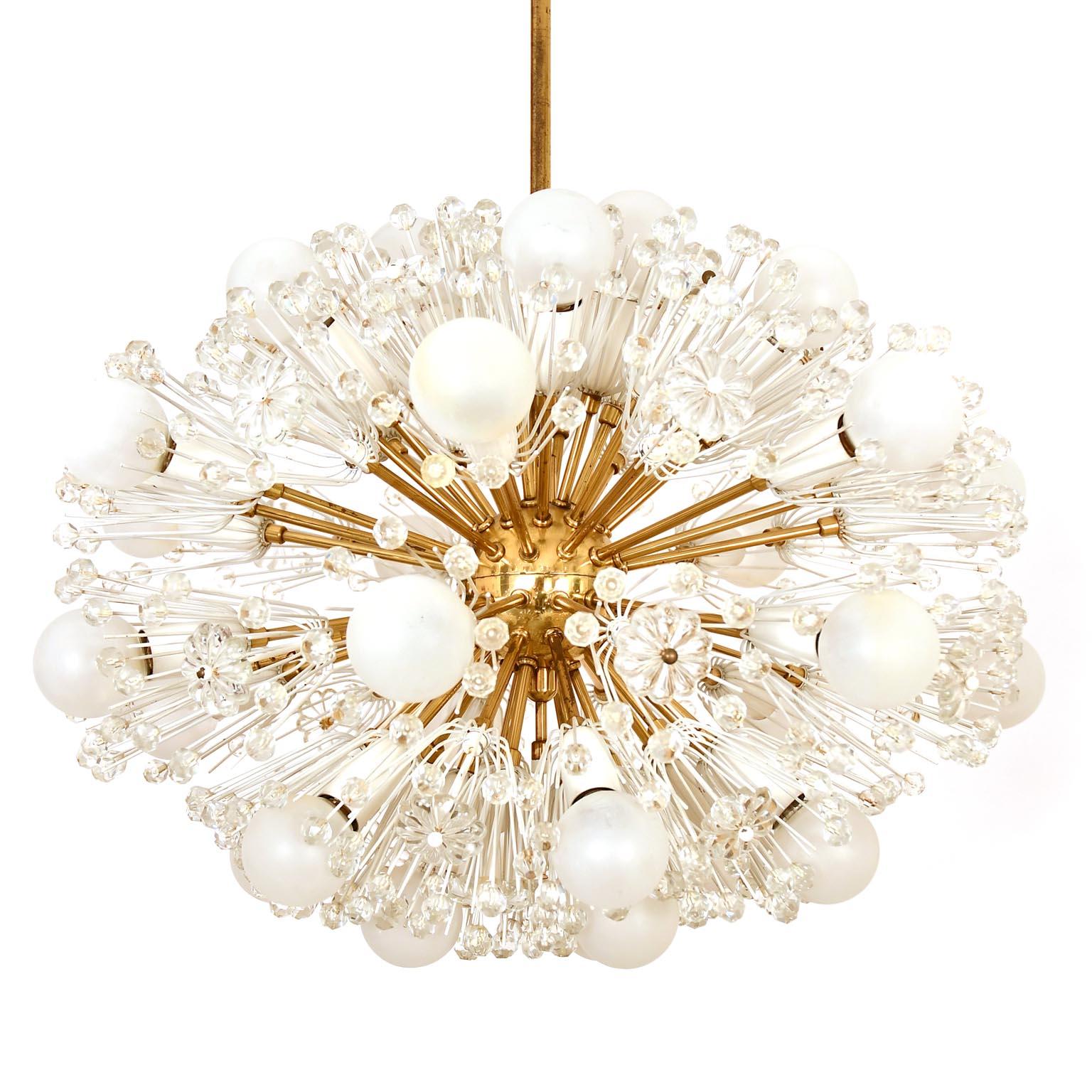 Sputnik chandelier designed by Emil Stejnar in Vienna / Austria, executed by Rupert Nikoll. Brass base, the thin tiny metal rod are painted white. Fine original condition.
Born in 1939, the trained goldsmith and silversmith designed a very similar
