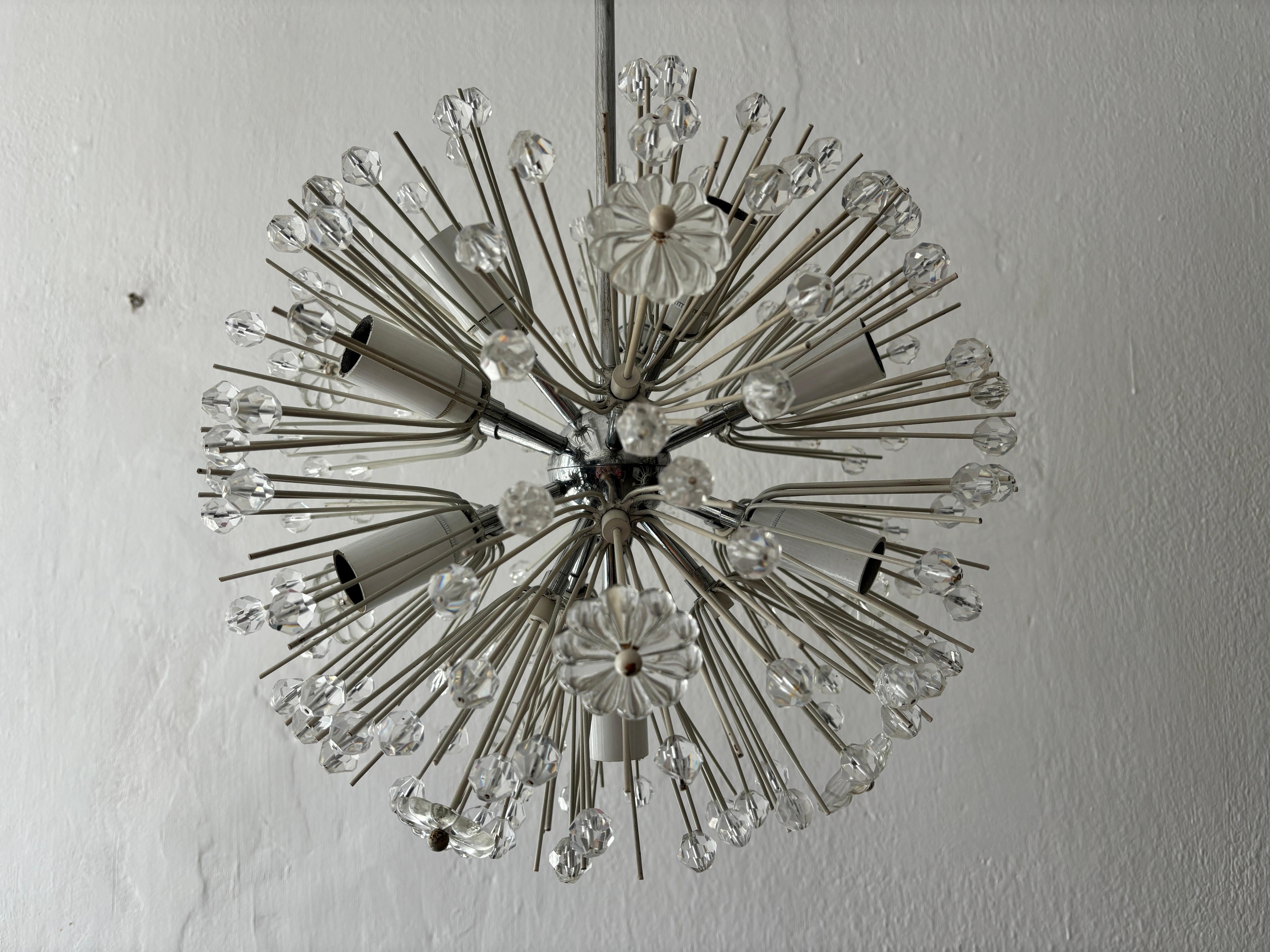 A rare 10 light snowflake sputnik chandelier designed by Emill Stejnar for Nikoll.  This will be arriving completely newly rewired with certified US UL sockets for USA and ready to hang.  Ball itself measures 15 inches round.  Adding another 22