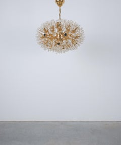 Emil Stejnar Lampada lampadario a stella in ottone e vetro oro, Austria, 1970