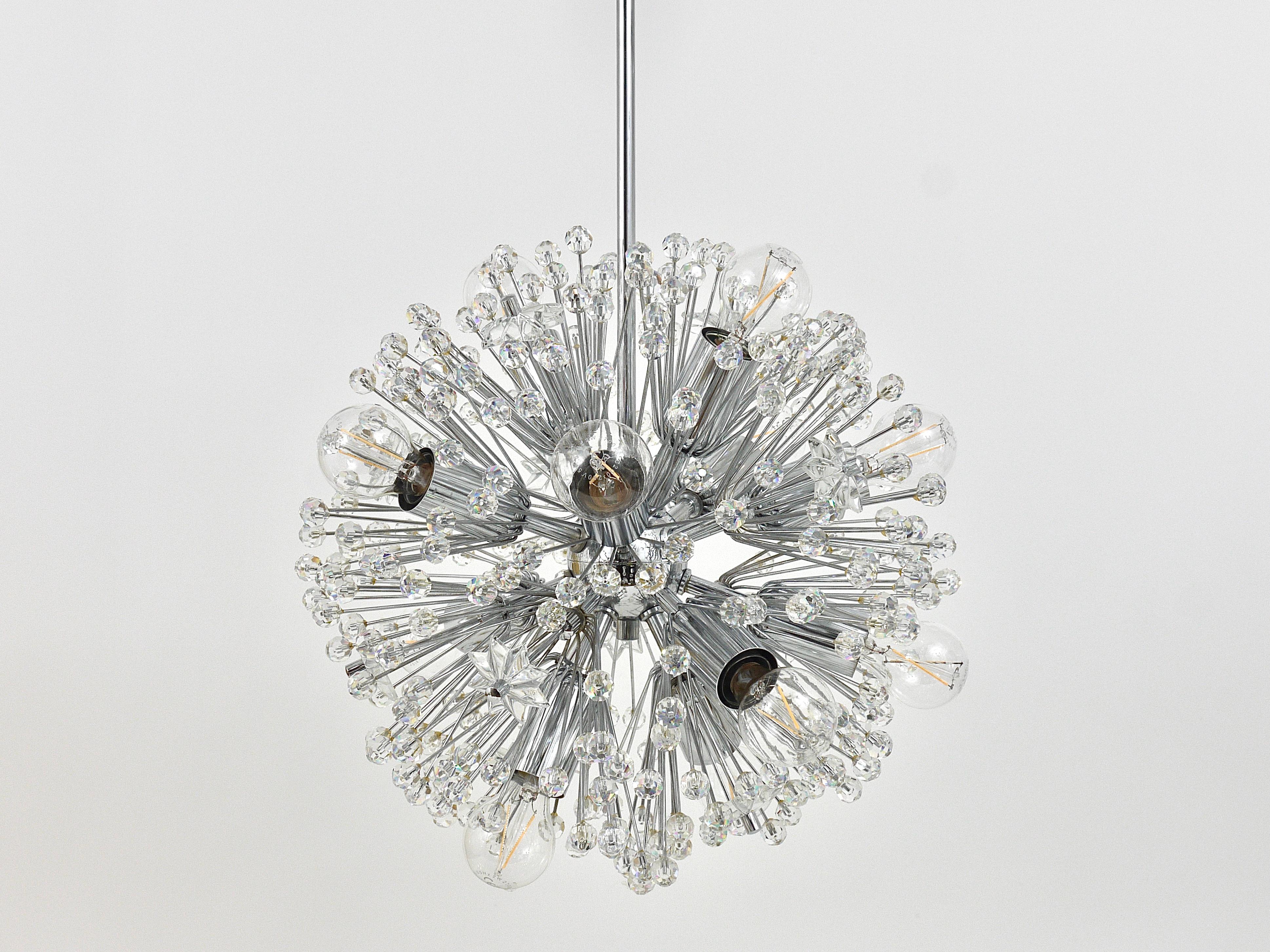Beautiful nickel / chrome-plated snowflake blowball sputnik chandelier, made in Austria in the 1970s. This chandelier has a diameter of 13 in, its total height incl. rod is 38 in. It offers 11 light sources and makes a wonderful light. Looks great