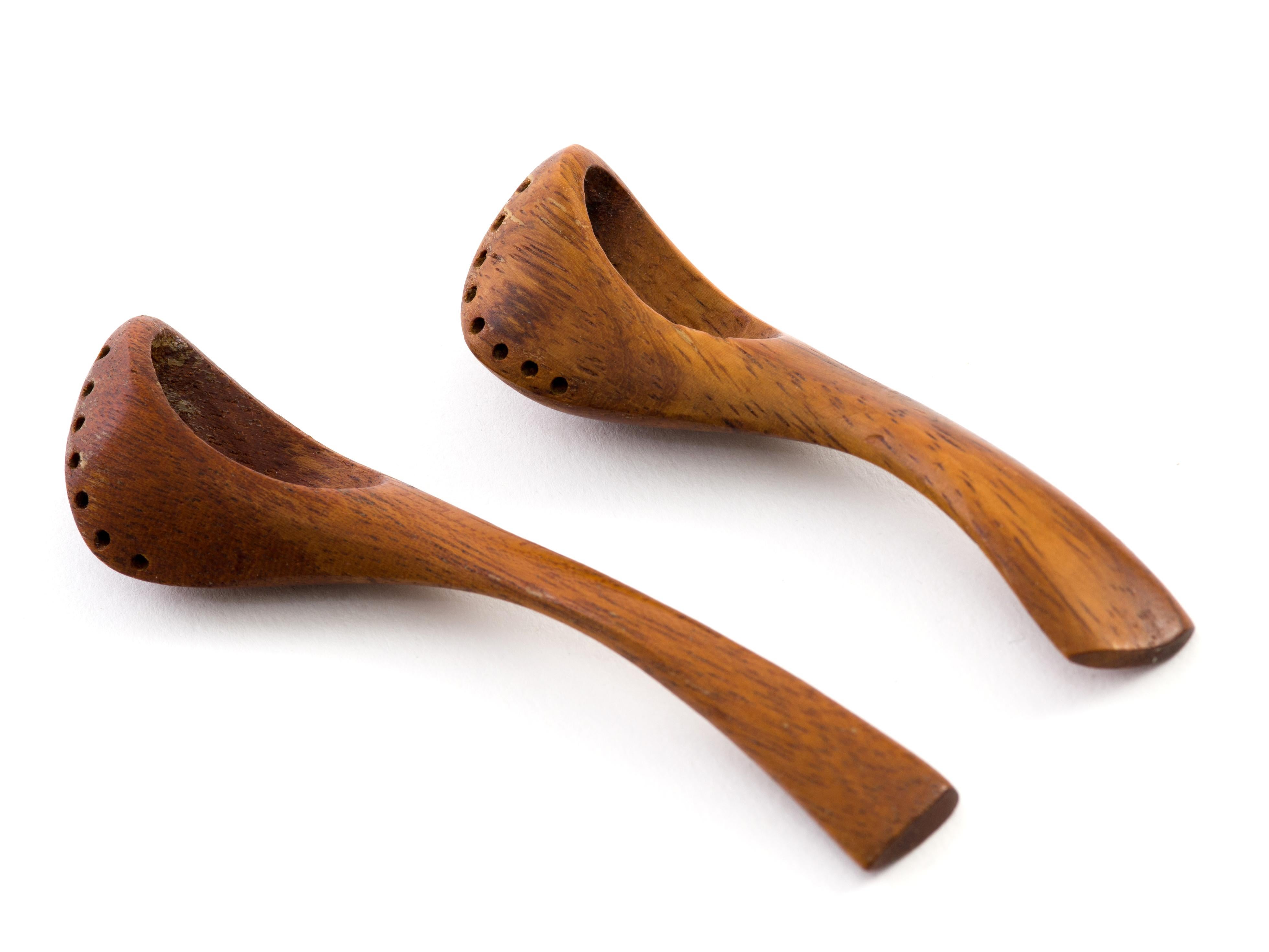 A lovely pair of hand-sculpted spoons for salting by American master woodworker, Emil Milan. An ingenious design that reflects the artist's abundant creativity along with his disdain for any sort of waste (these spoons were often made from scraps