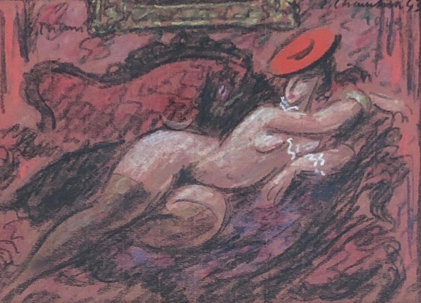 Donna bugiarda con cappello rosso