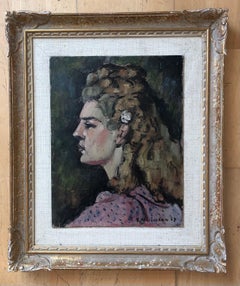 Young blonde woman posing in profile