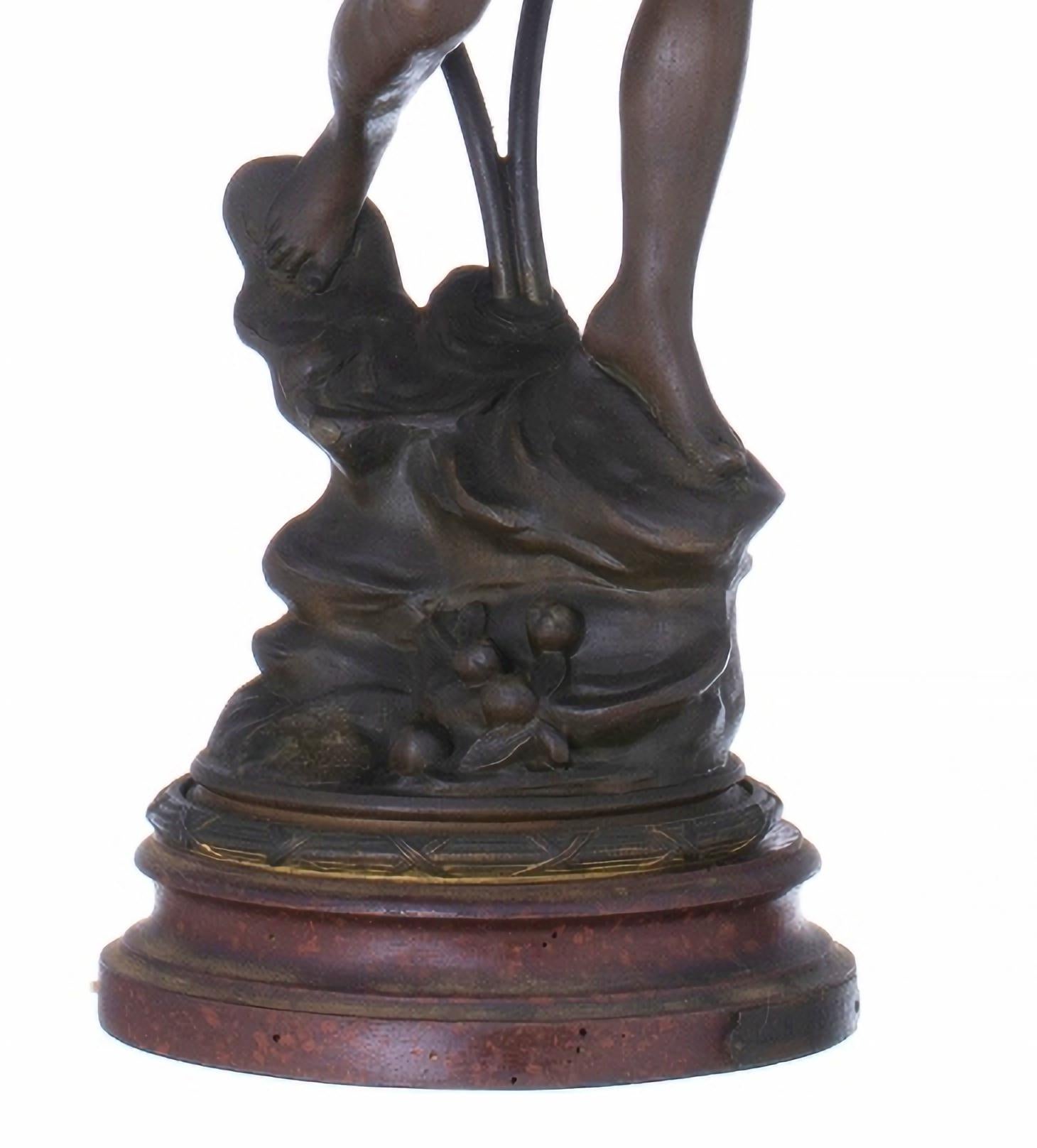 Emile François Rousseau (1853-?)

Art bronze two-light table lamp with two glass tulips.
Mounted on a wooden base.
Signed.
small defects
Measure: height: (total) 78 cm.
Good conditions.