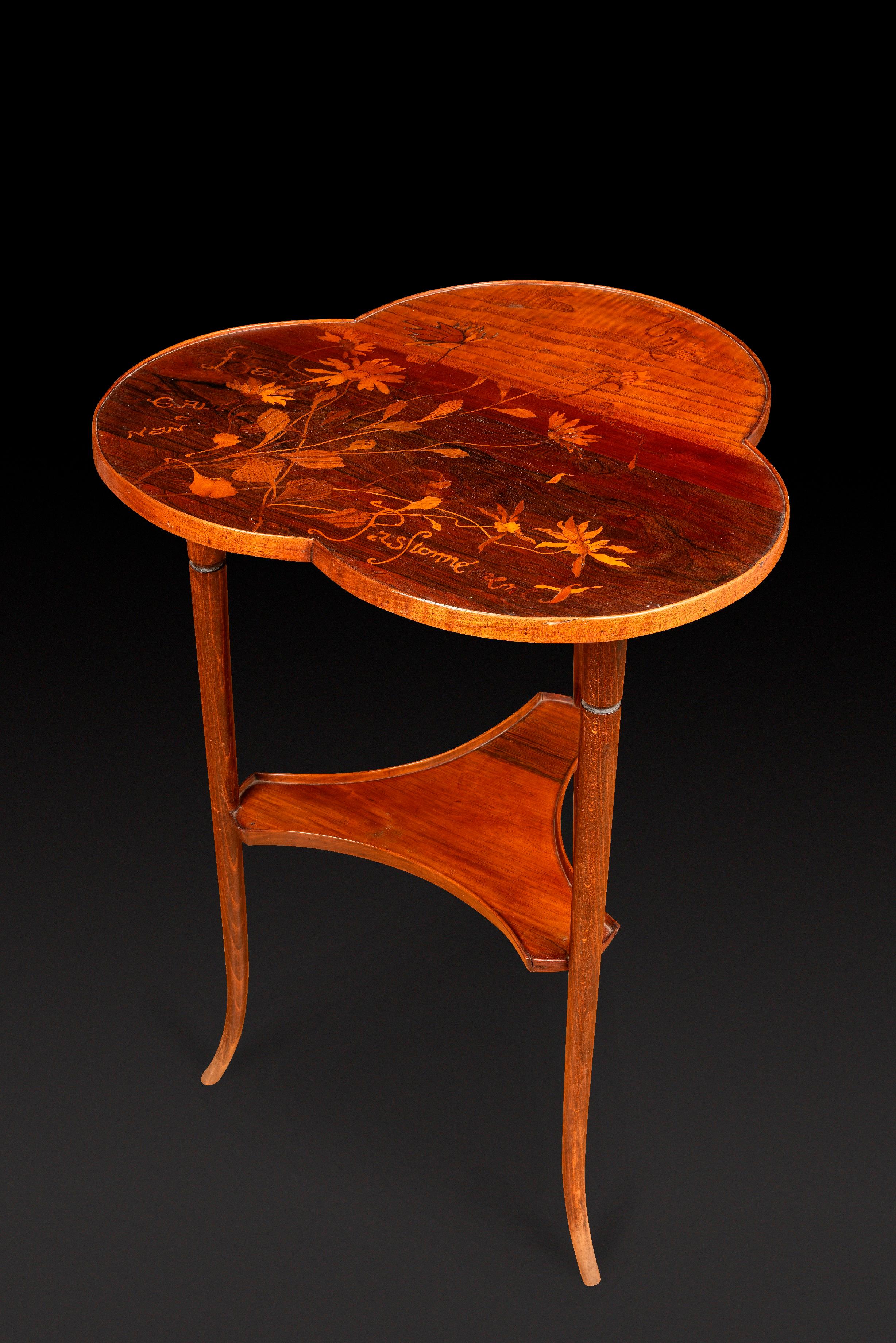 ÉMILE GALLÉ (1846-1904) Art Nouveau Side Table with a Trilobed Marquetry Top and Floral Décor:

Be enchanted by the splendor of this masterpiece signed by Émile Gallé, where nature herself seems to whisper in your ear. This rare trilobed side table,