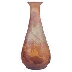 Emile Gallé, art glass vase decorated with flowers in purple. Ca. 1915-1920.