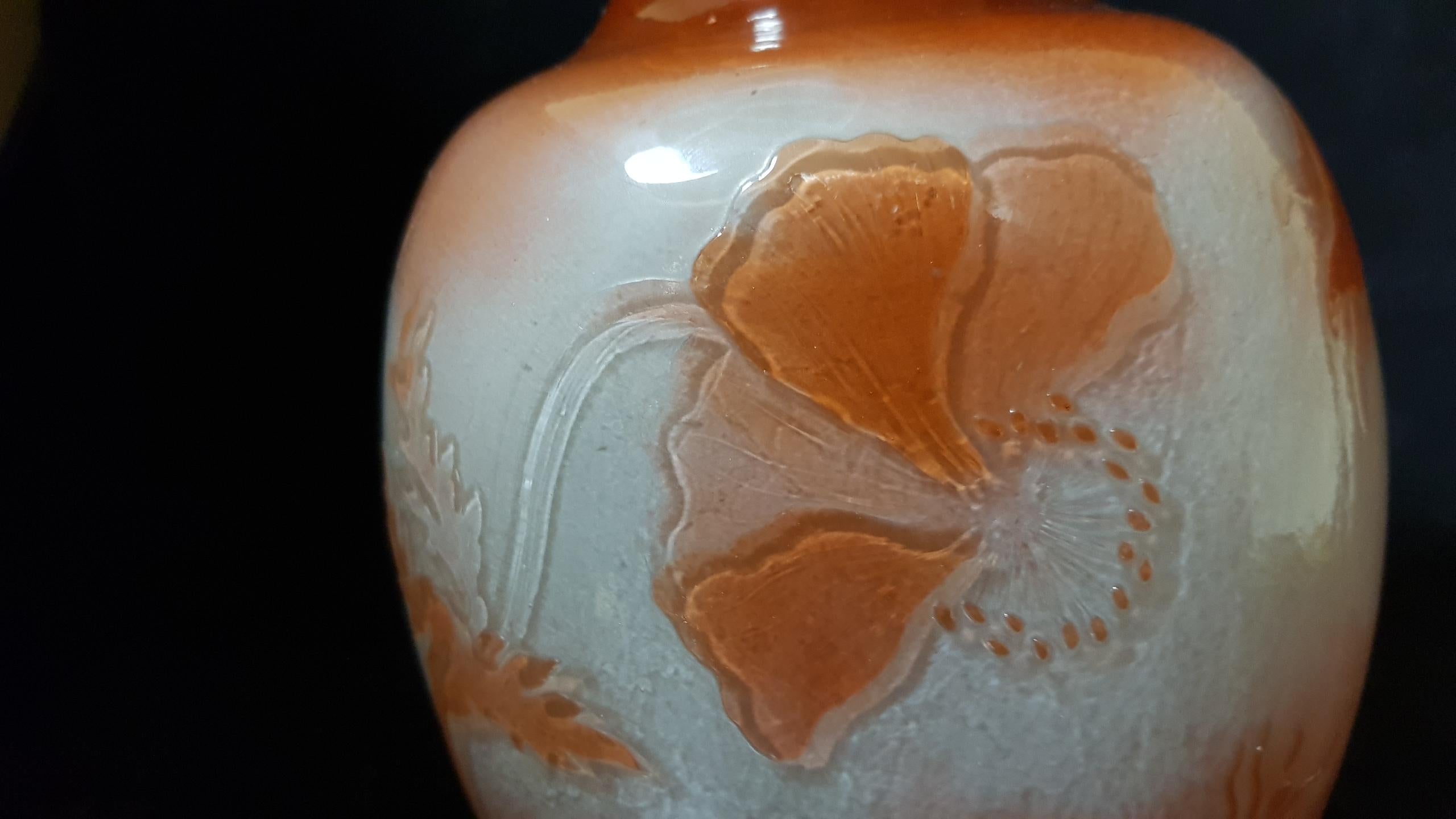 Emile Gallé, France, (early 1900): fire-polished multi-layered (polished on fire) vase.
Rare finish in fire that makes the vase particularly shiny.
Signed.
Measures: H 18 cm.