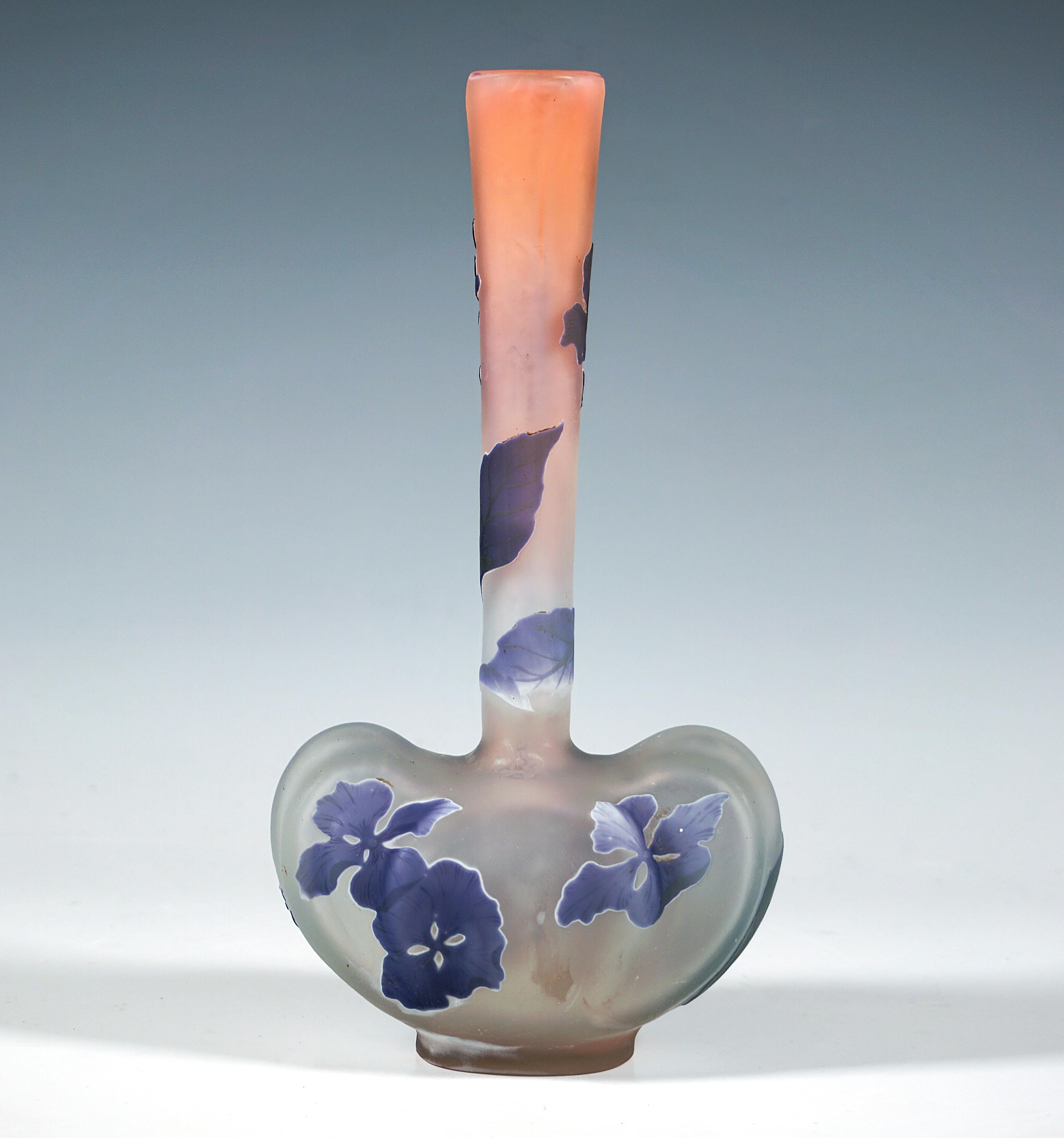 Vase with heart-shaped body on an oval base, long, slender, slightly widening neck, colourless glass with pink powder melt inclusions in the upper area, layered in violet, etched hydrangea decoration in different levels, matted 
inside and