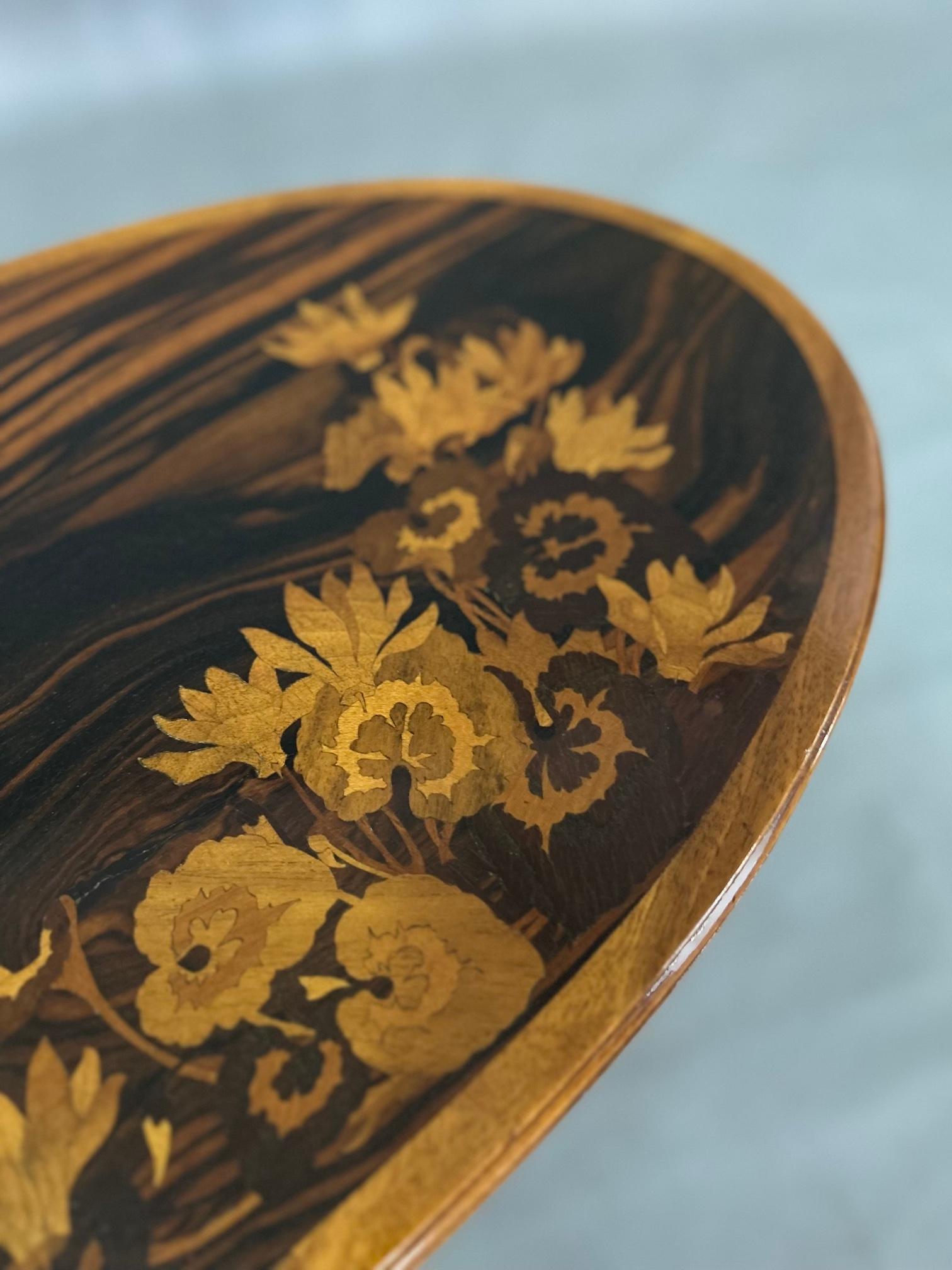 Macassar ebony and sycamore Emile Gallè Art Nouveau floral marquetry oval side table.