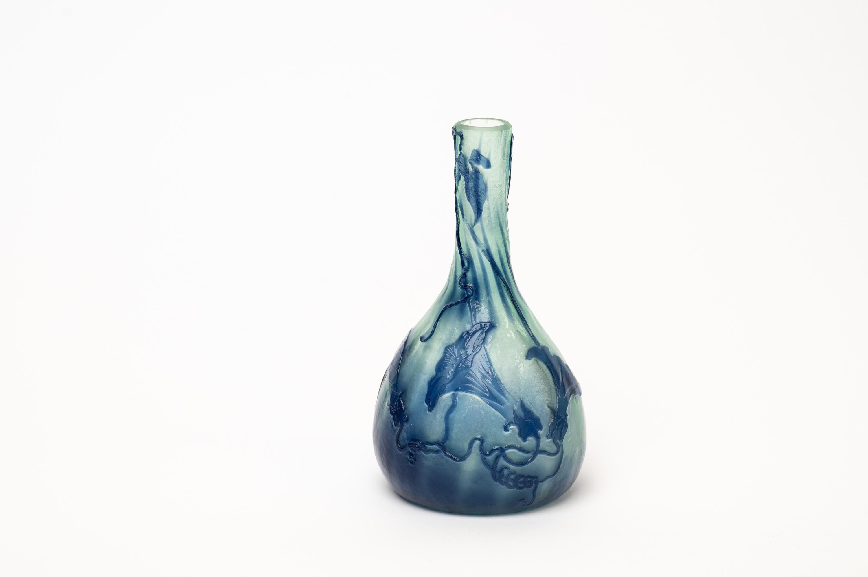 French glass vase by Emile Gallé decorated in various shades of blue and white. It dates from around the 1900s and is in excellent original condition. 

Emile Gallé, a French artist and designer who worked in glass, was born in Nancy, France, in