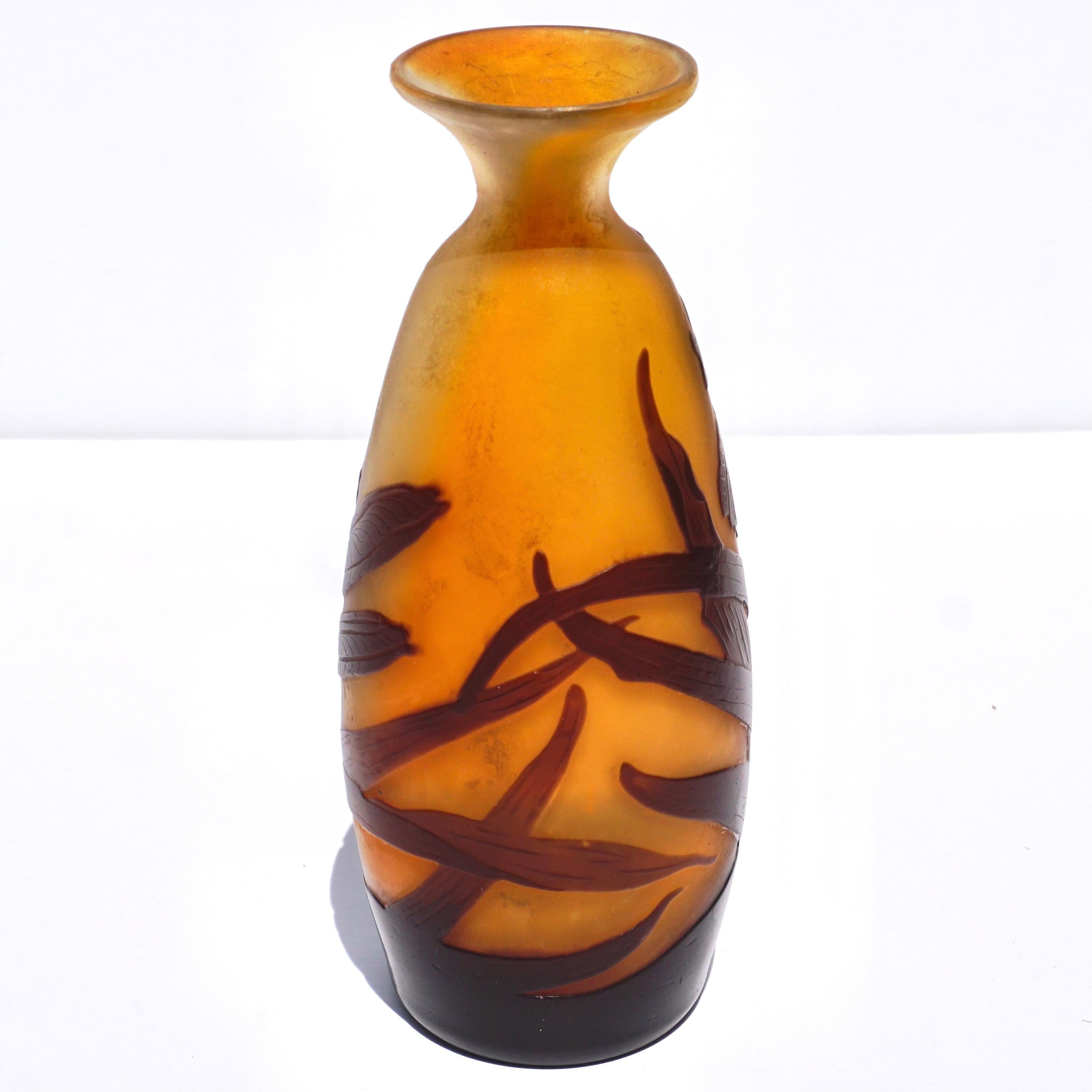 A wonderful Emile Galle cabinet vase in orange, yellows and purple wheel carved and acid etched depicting Iris flowers, pods and leaves. Circa 1900 Art Nouveau.

Measures: Height: 6.5 Inches

Signed: Galle

Condition: Excellent. Dirty.

AVANTIQUES