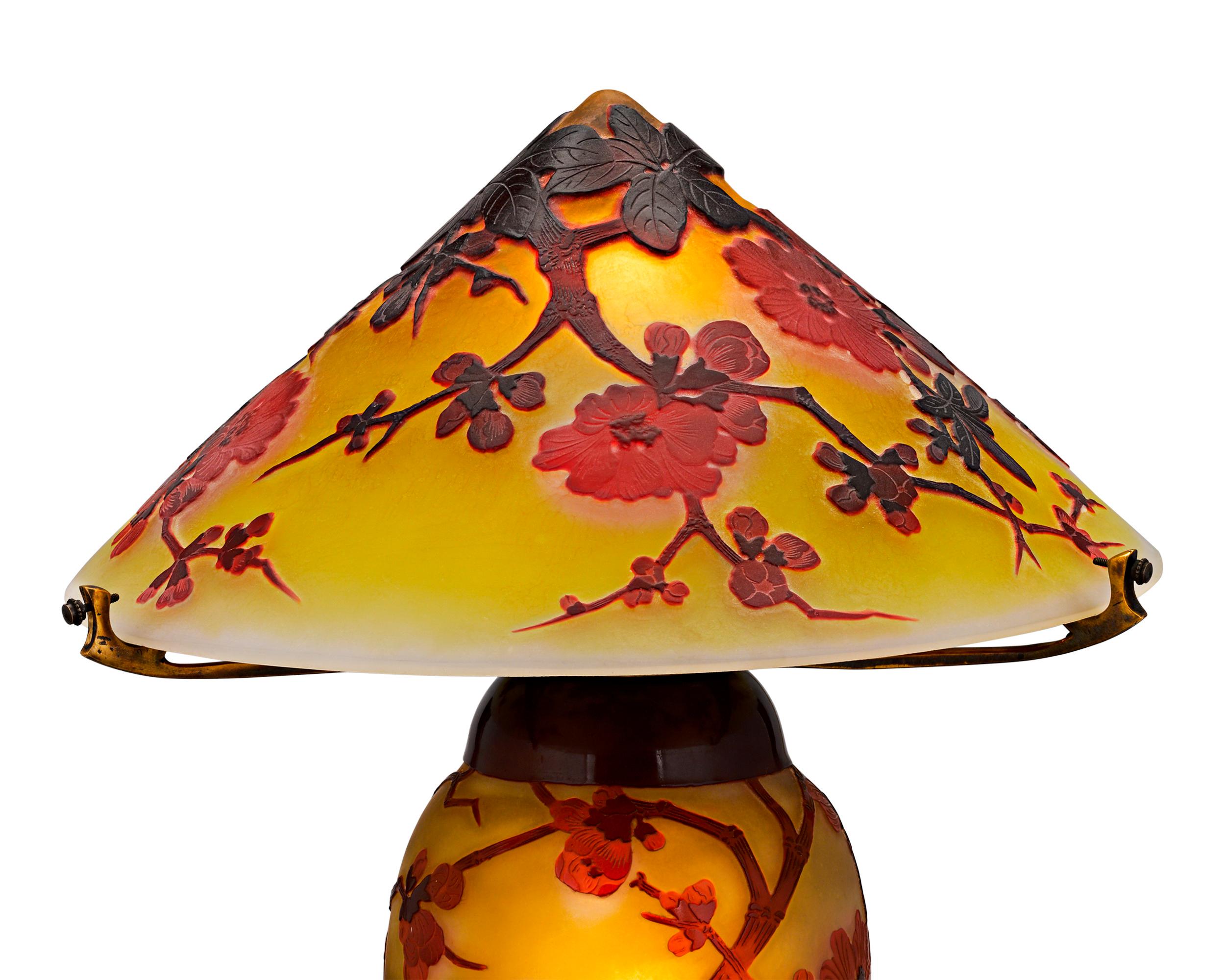This exceptionally rare cameo glass lamp is the work of the inimitable French glassmaker Émile Gallé. Entirely handcrafted, the exquisite piece is a testament to Gallé's mastery of this delicate art form. Careful wheel-carving and acid-etching