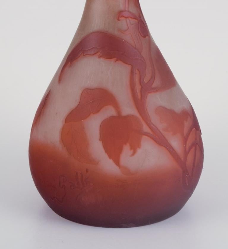 French Emile Gallé, early and rare art glass vase decorated with flowers. Ca 1900 For Sale