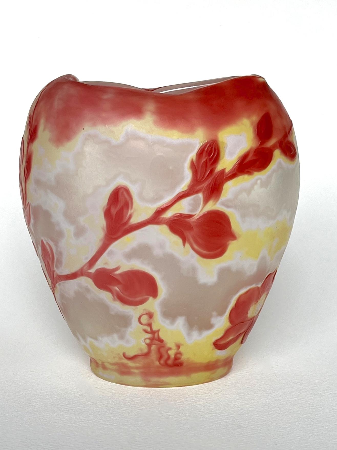 A very fine and rare cameo glass vase from France's leading 'Maître Verrier' (master glass-maker),  Émile Gallé. The vase is of a flattened heart-shape, with a pinched irregular rim and consists of four layers of glass - a deep dusky rose, yellow