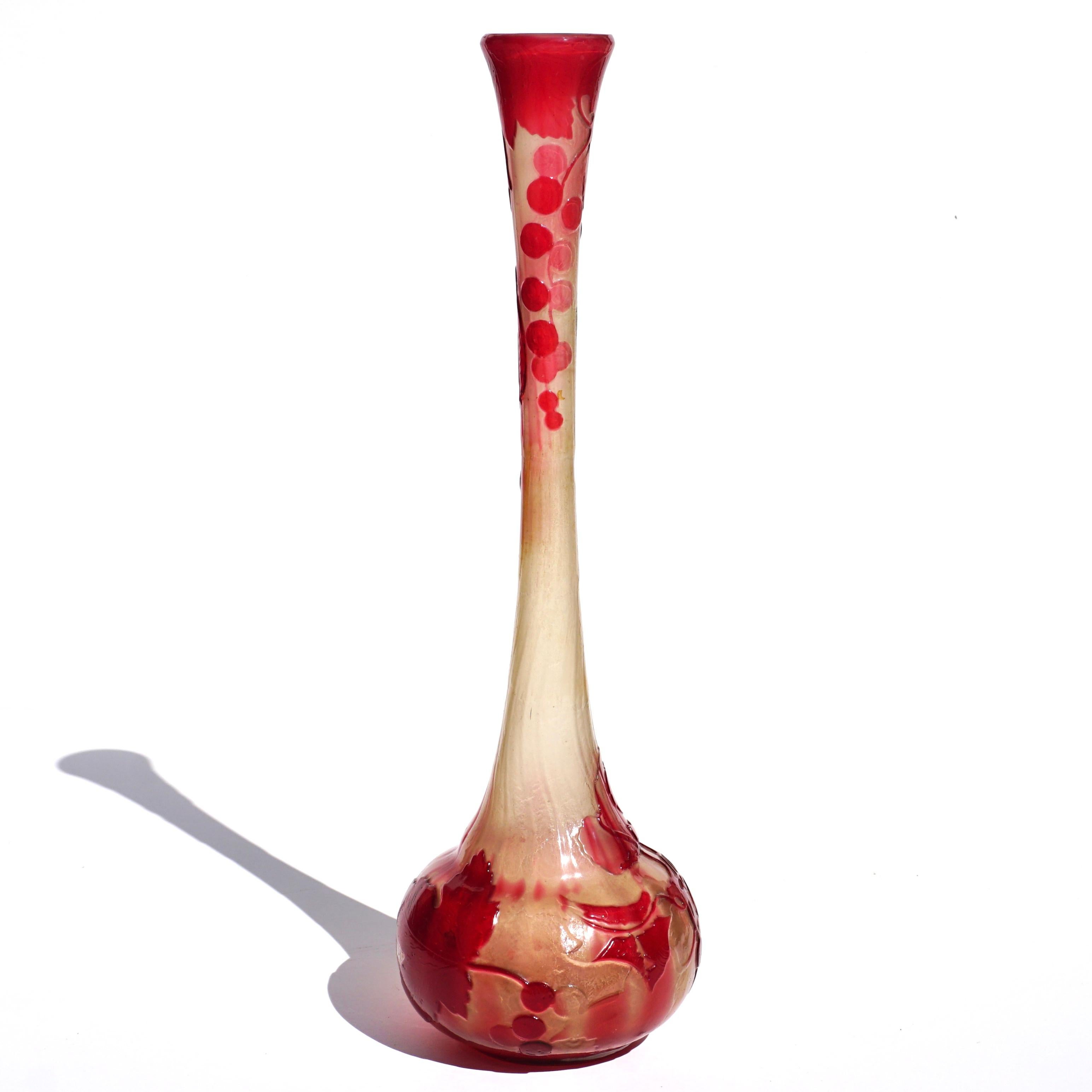 Tall Early Gallé Fire-Polished Cameo Glass Solifleur Vase, circa 1900

Signed: In Japonism script  “gallé”
Height: 12.4  inches (31.5 cm)
Tall vase with pendant redcurrants and foliage acid-etched in red overlay.
Condition:  In overall excellent