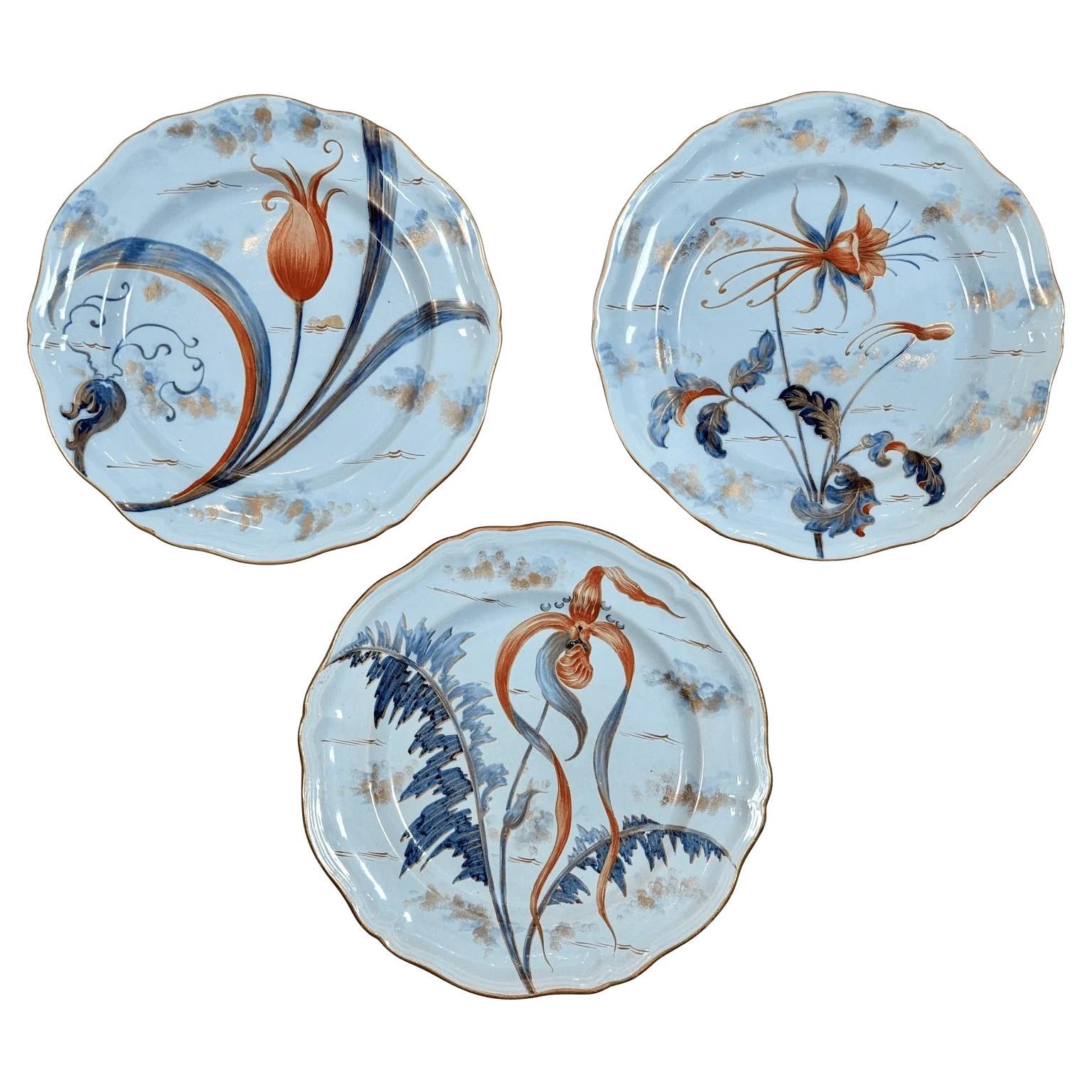 Assiettes florales d'Émile Galle, vers 1880, lot de trois