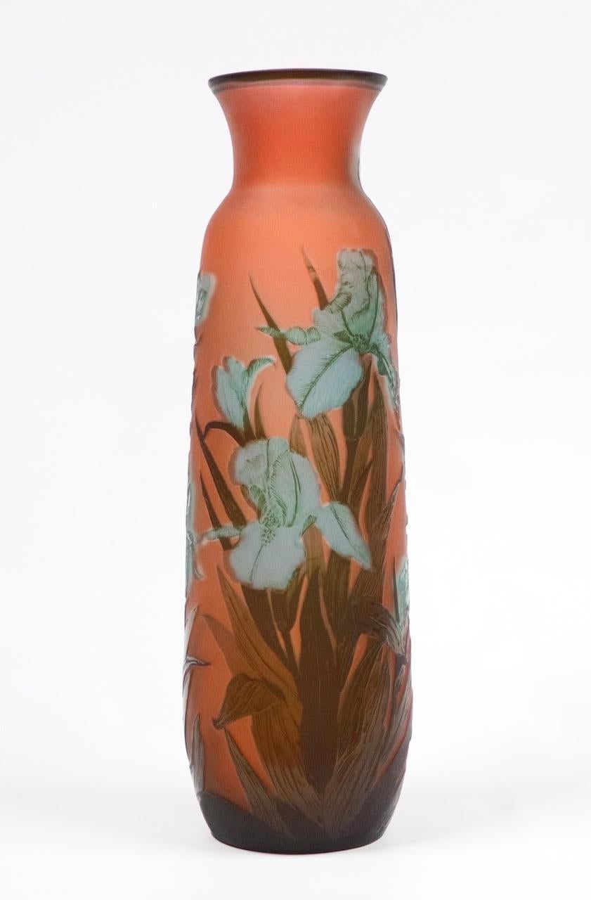French Art Nouveau cameo glass vase of monumental size, made by Emile Galle. The piece features a theme with blooming lilies and foliage and is signed 'Galle'. In great vintage condition with age-appropriate wear.