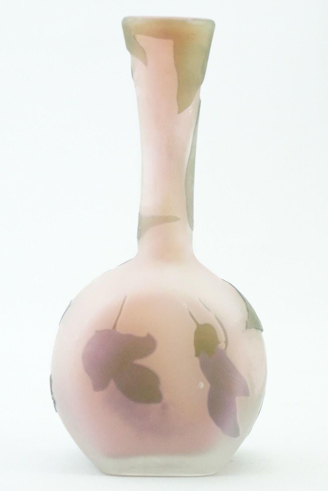 Emile Galle Cameo glass vases, Ca. 1900, Nancy, France, decorated with mauve, purple and green flowers on a pink shaded ground, signed 