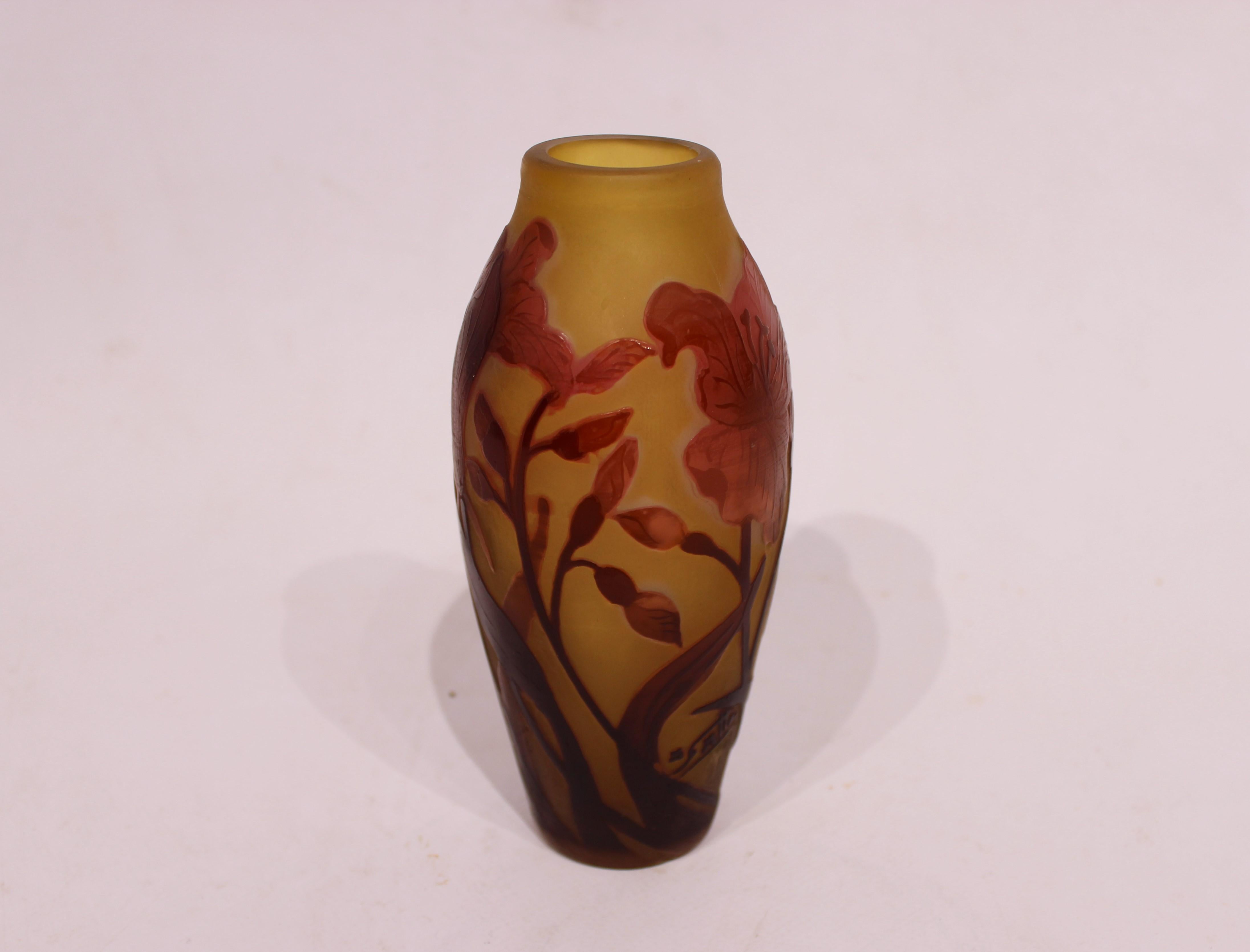 The Emile Gallé glass vase from France, beautifully decorated in dark colors and dating back to the circa 1900s, is a remarkable and exquisite example of Art Nouveau glasswork.

Emile Gallé was a renowned French artist and glassmaker, known for his