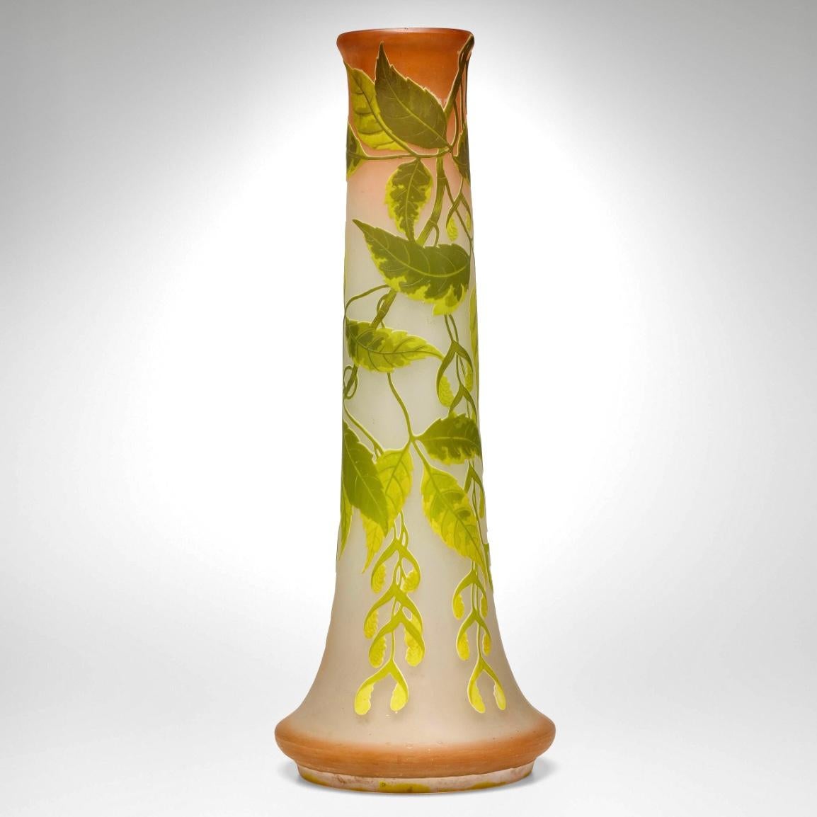 Emile Galle Tall vase with maple branches
France, c. 1907-1907
Wheel carved and Acid-etched Cameo Glass Vase
Height: 21.5  Inches X 8 Inch diameter  (55 × 20 cm)
Condition: Very Good with no chips, cracks or repairs. Scratches on bottom.

I love
