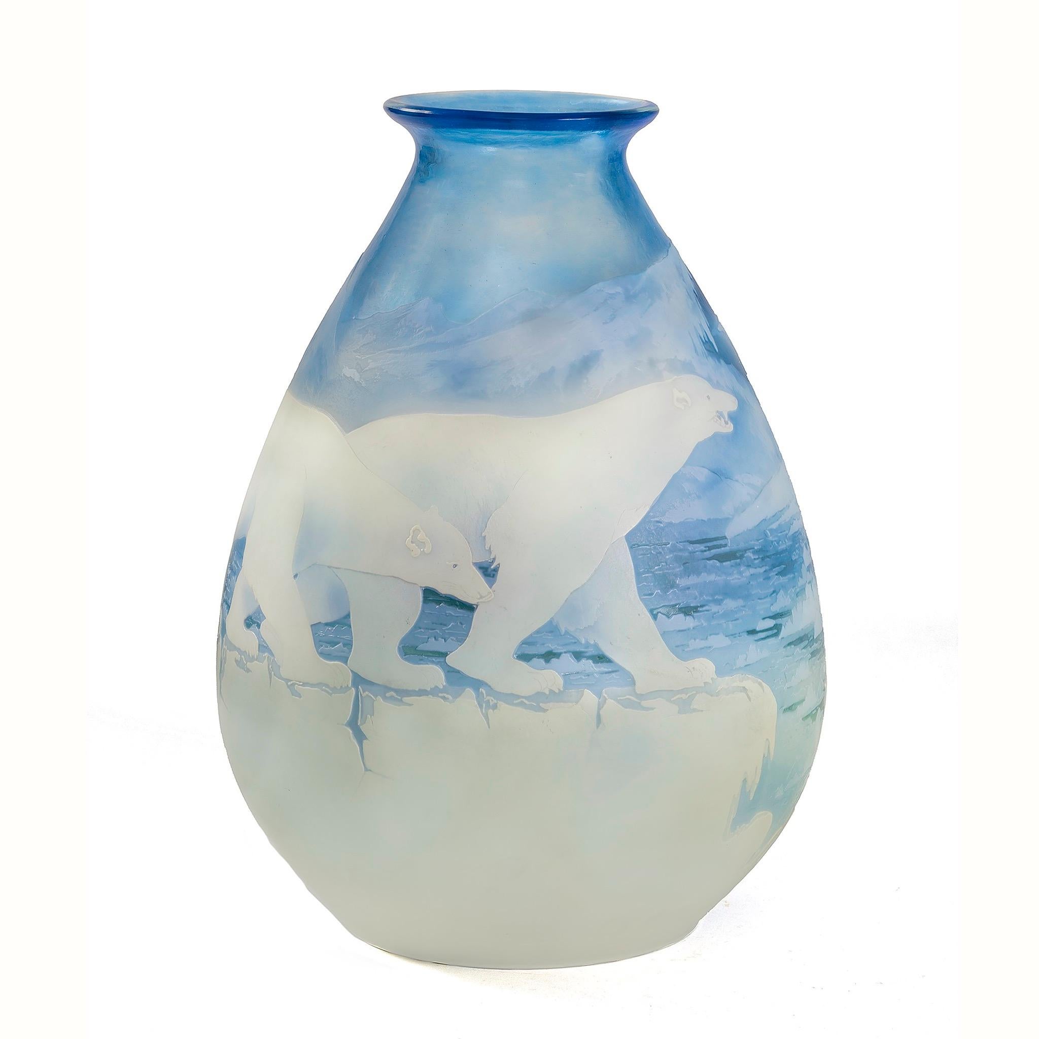 This exquisite Émile Gallé “Ours Polaires” cameo vase showcases three polar bears navigating ice floes in an Arctic landscape, framed by distant icebergs rendered in stunning shades of blue and white. Polar bear motifs gained popularity in the
