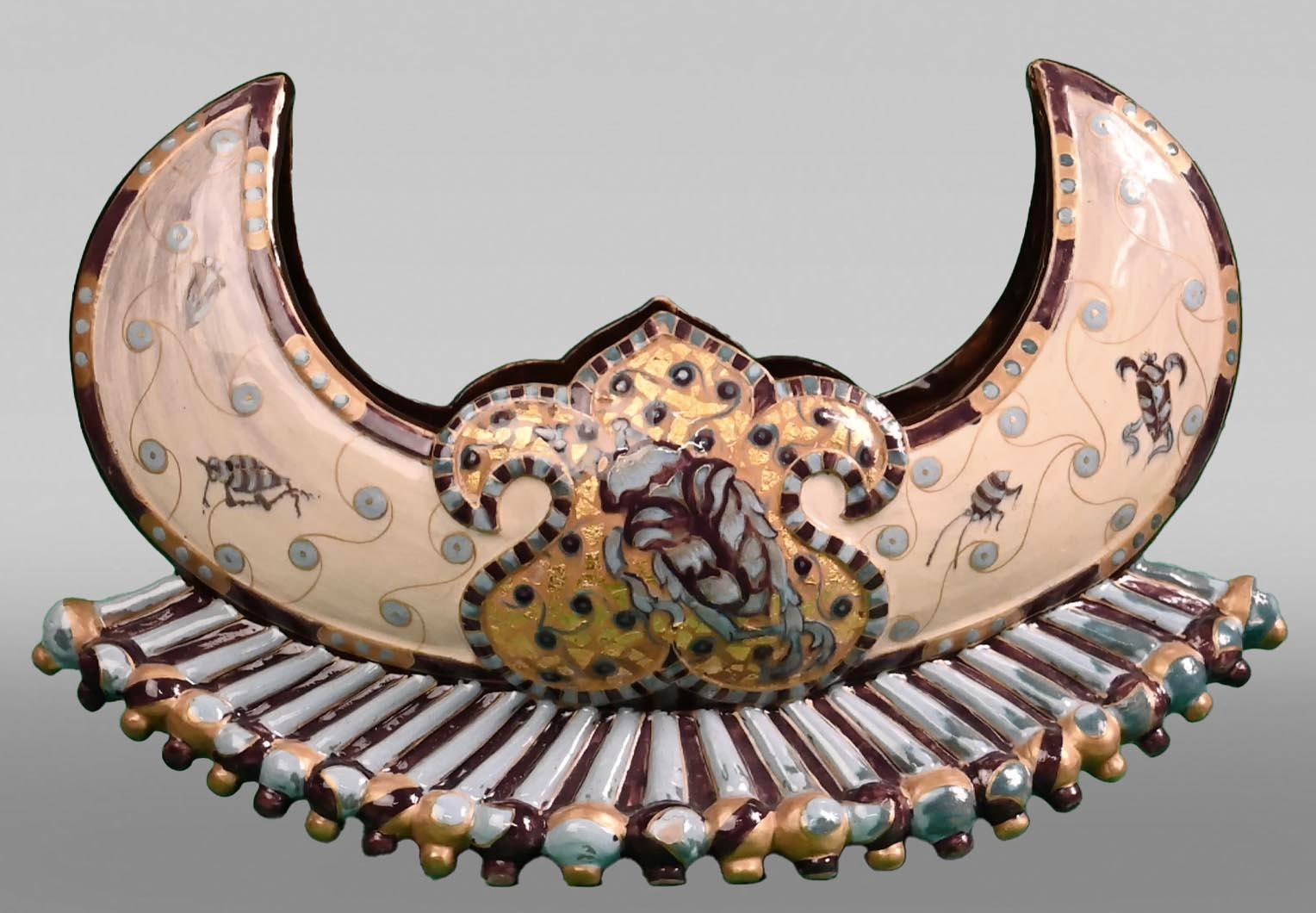 Taking Mediterranean Antiquity as his theme, Emile Gallé created this rare and original piece.

A ceramist and glassmaker, Gallé was one of the greatest names in the Art Nouveau movement and the founder of the Ecole de Nancy. This bowl in glazed