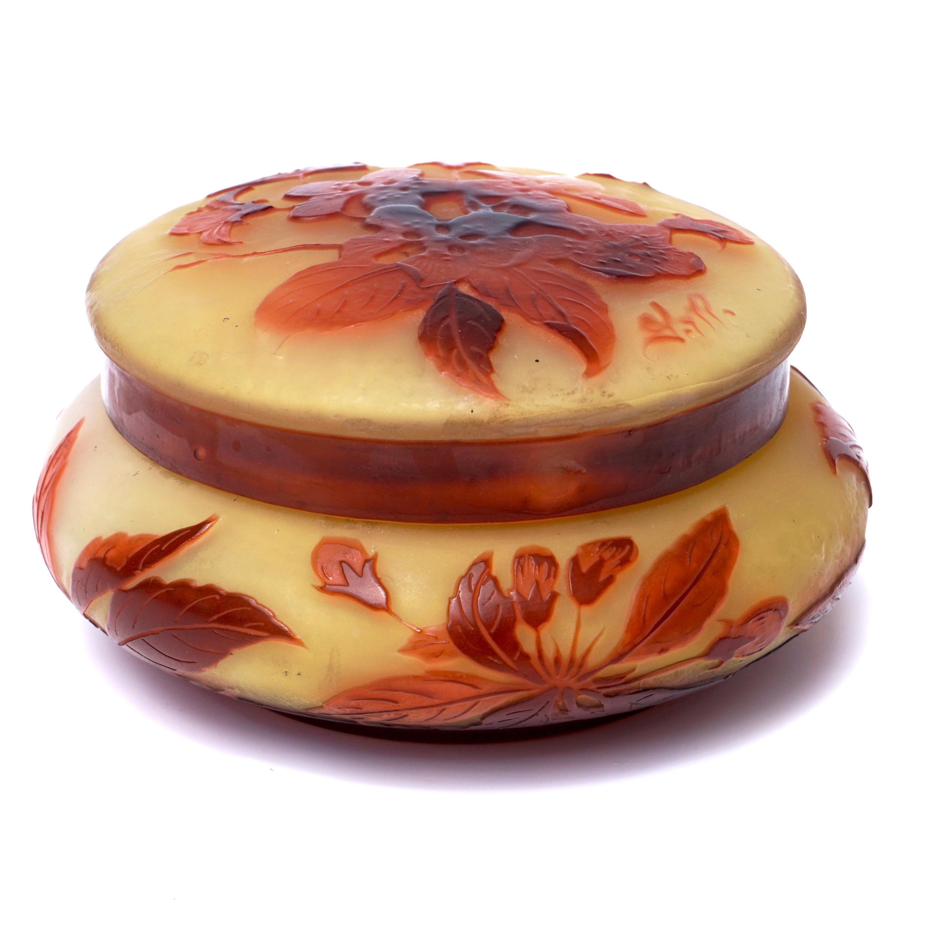 Gallé Cameo Glass Floral Covered Box, circa 1900 
Marks: Gallé 
2.5 x 4.25 inches (6.4 x 11 cm) 

We are dedicated to providing an exclusive curated collection of Fine Arts, Paintings, Bronzes, Asian treasures, Art Glass and Antiques. Our
