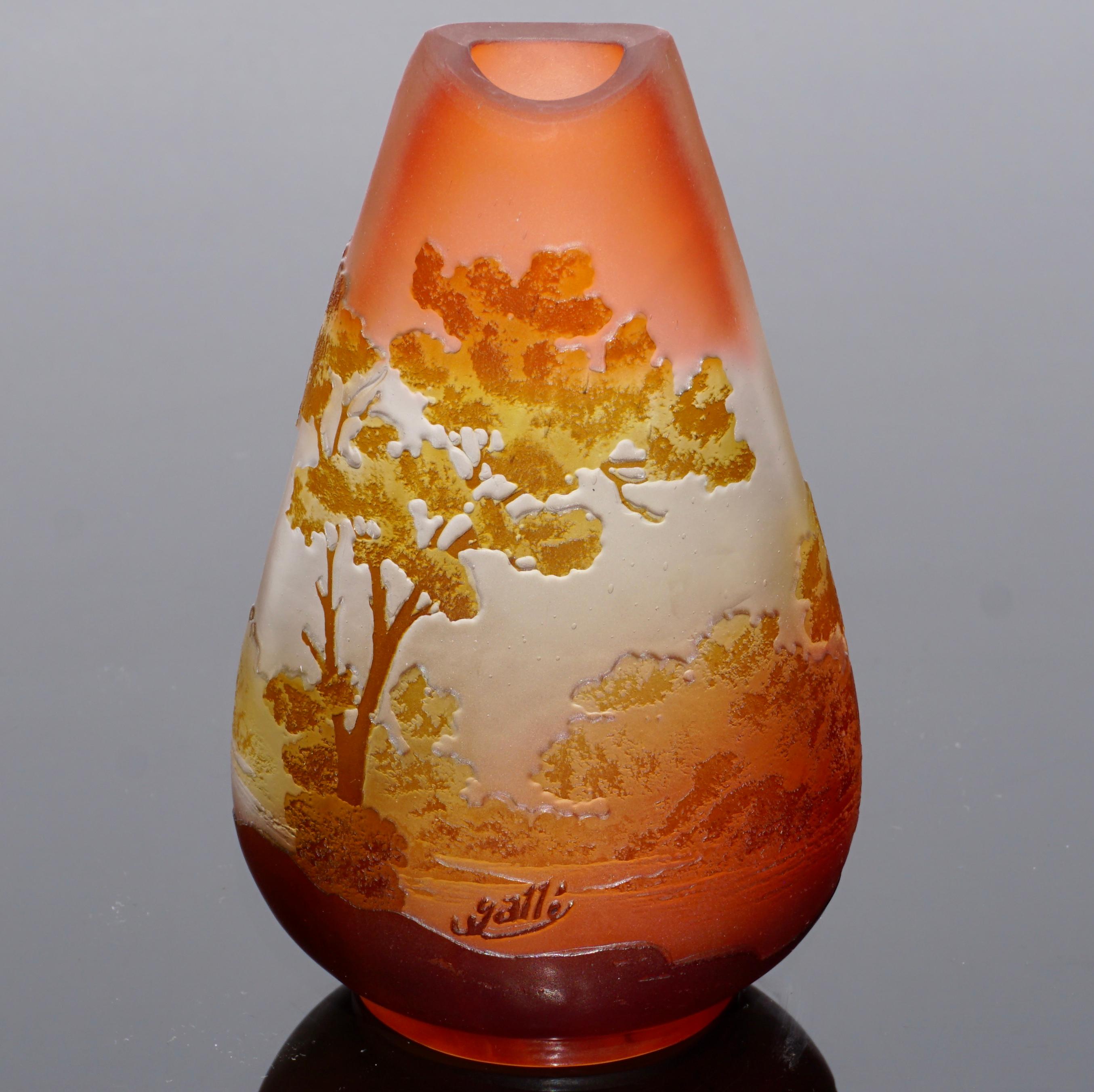 A wonderful French scenic Emile Galle Art Nouveau, circa 1900 acid etched cameo cabinet vase for your collection or a special gift. Reds, peaches and browns make the pallet for this lake scene with trees in the fore and background. The detailing is