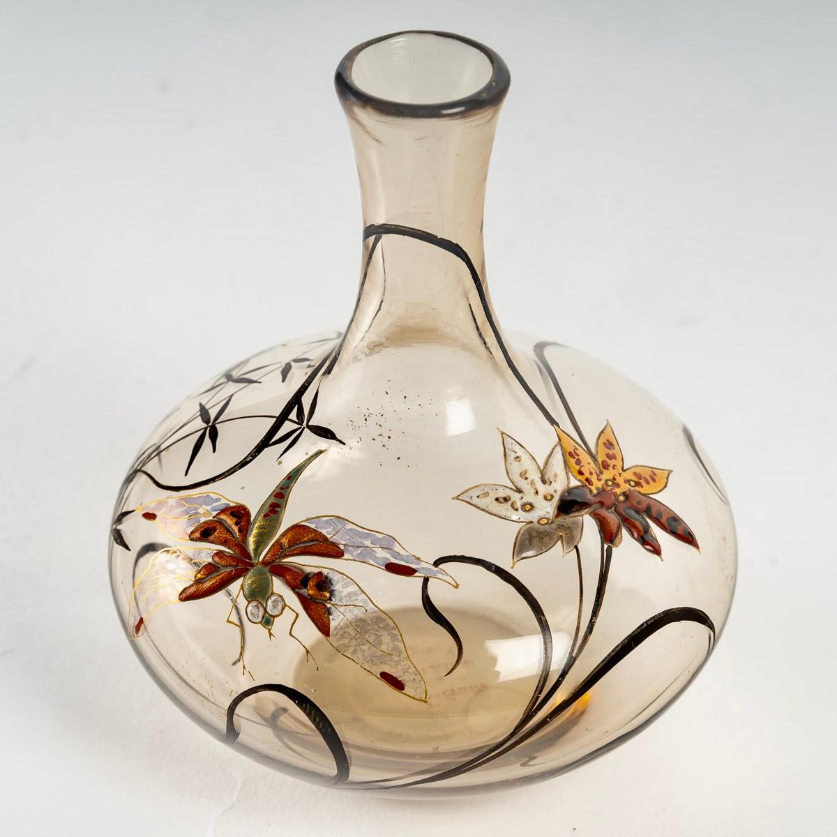 Vase Cristallerie made in smoked glass with enamelled dragonfly and flowers. 
Signature under the vase.

Measures: Height: 11.6 cm
Diameter : 9,5 cm 

Perfect condition. Exceptional enamelling.