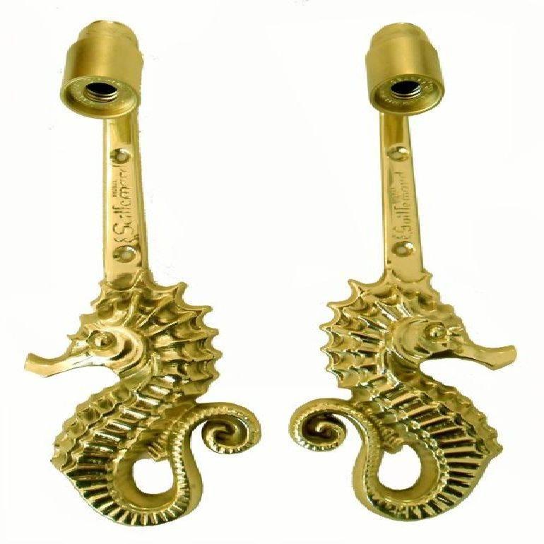 Fantastic set of seahorse sconces made by the famous French sculptor Emile Guillemard. Dimension without the shade : 11