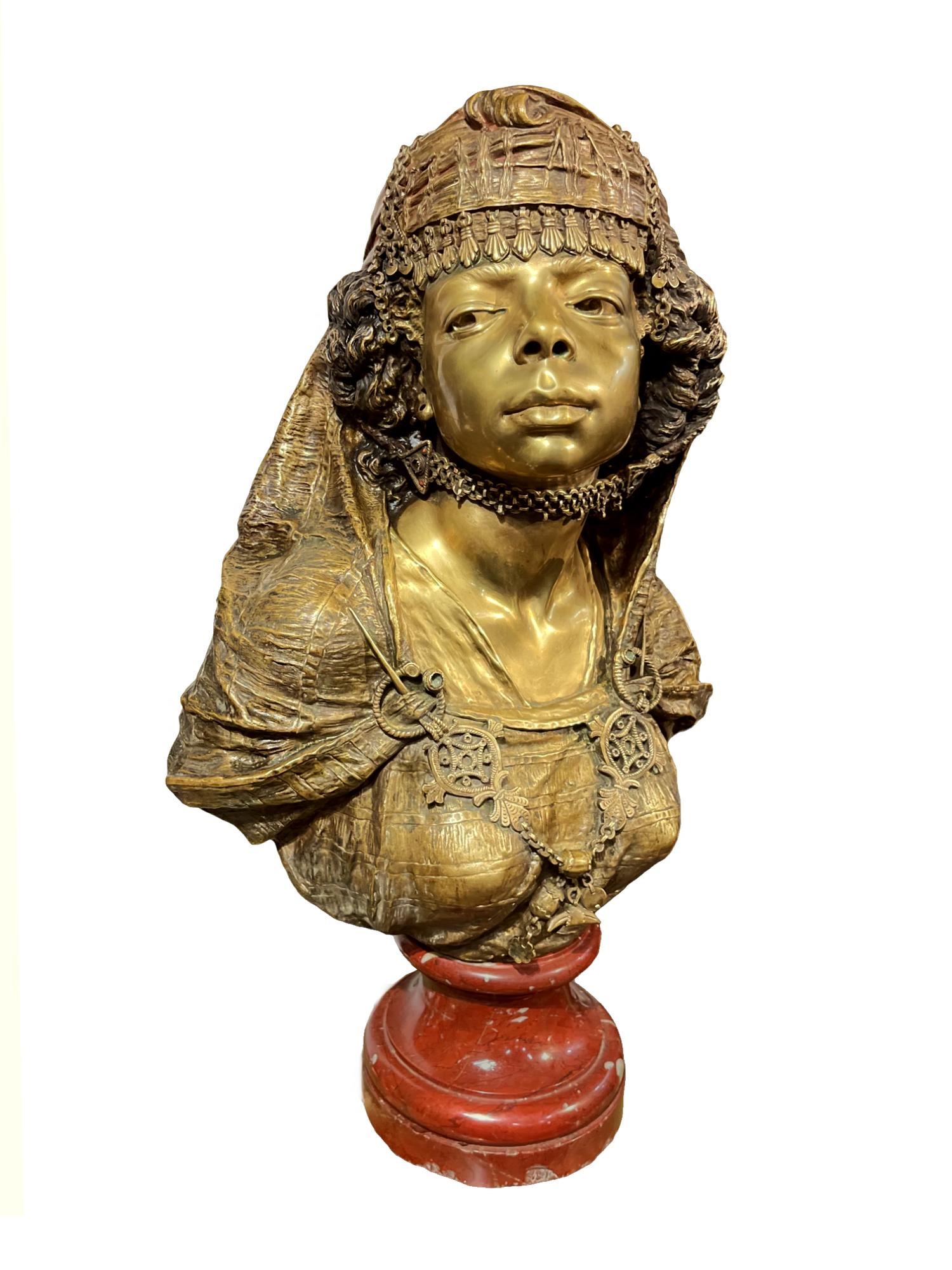 French Bronze high shine Orientalist Bust of Young Turkish Woman in Traditional Dress. Common for Orientalism, the bust is rendered in such high detail it feels as though the young woman sits before you. The gorgeous modeling showcases multiple
