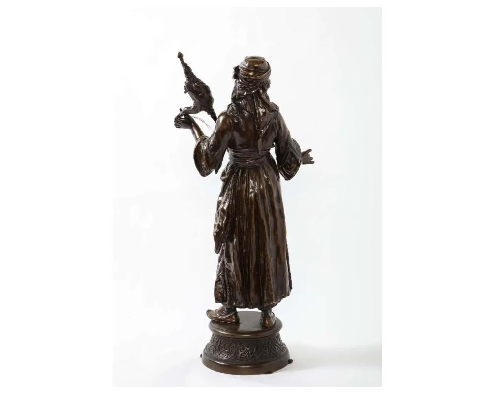 Bronze Émile Guillemin, une figure française en bronze patiné représentant une danseuse orientaliste en vente