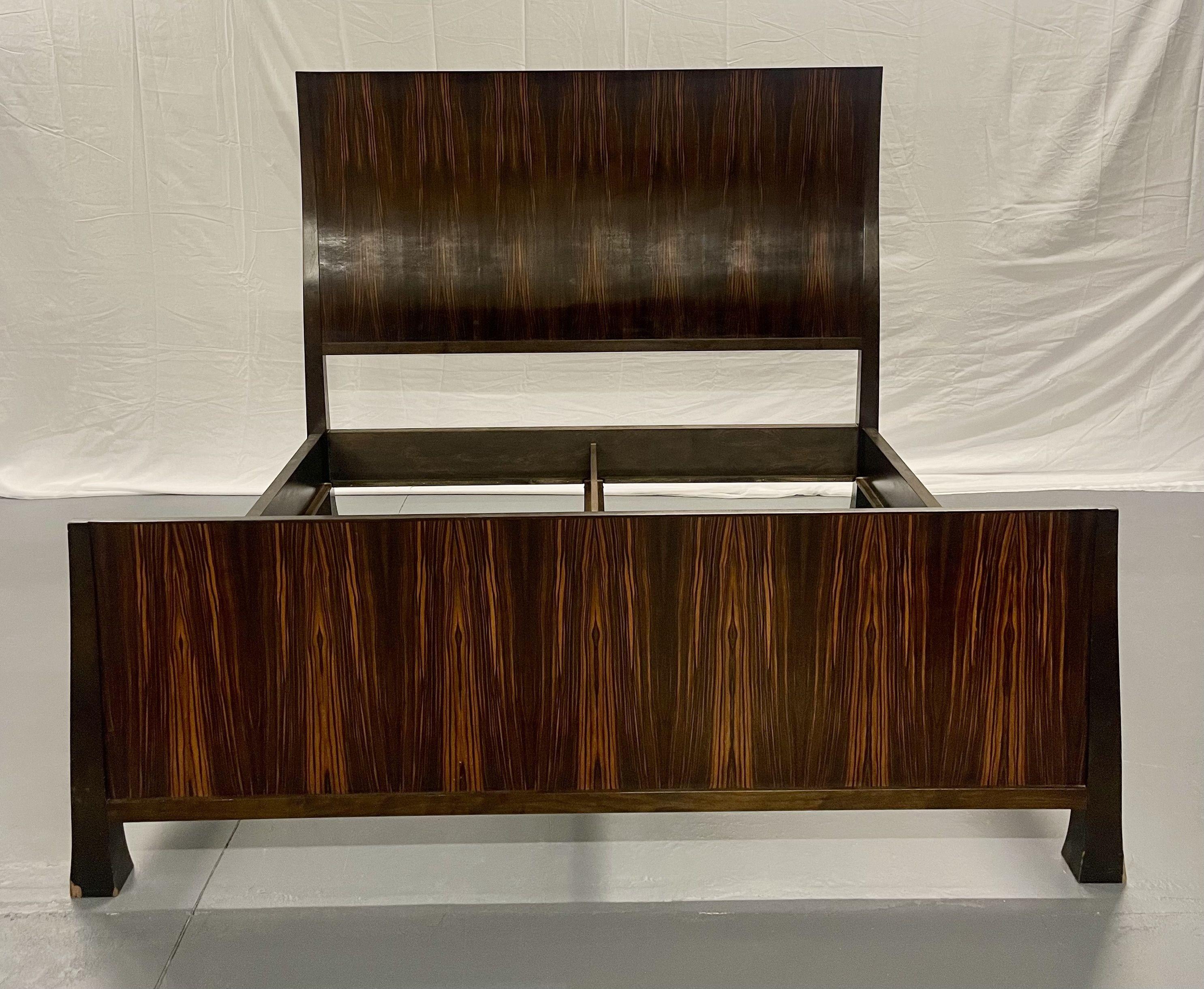 This stunning Headboard and Footboard with matching rails is simply magnificent. Unmarked, it bears a resemblance to Art Deco pieces by the esteemed maker Emile Jacques Ruhlmann. The fine, sloping carved contour of the frame in addition to the