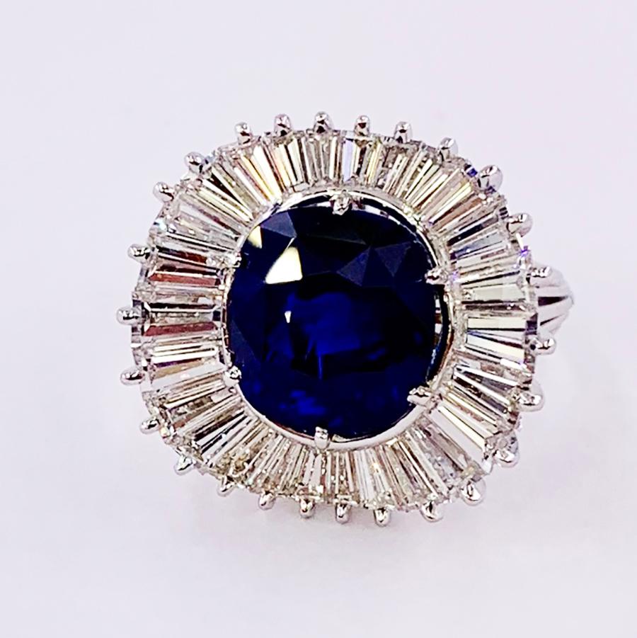 Emile Meister Platinum Ring with GRS certified 7.97 carat Vivid Royal Blue Ceylon Sapphire and approximately 3.00 carats of D- E color VVS clarity diamonds.