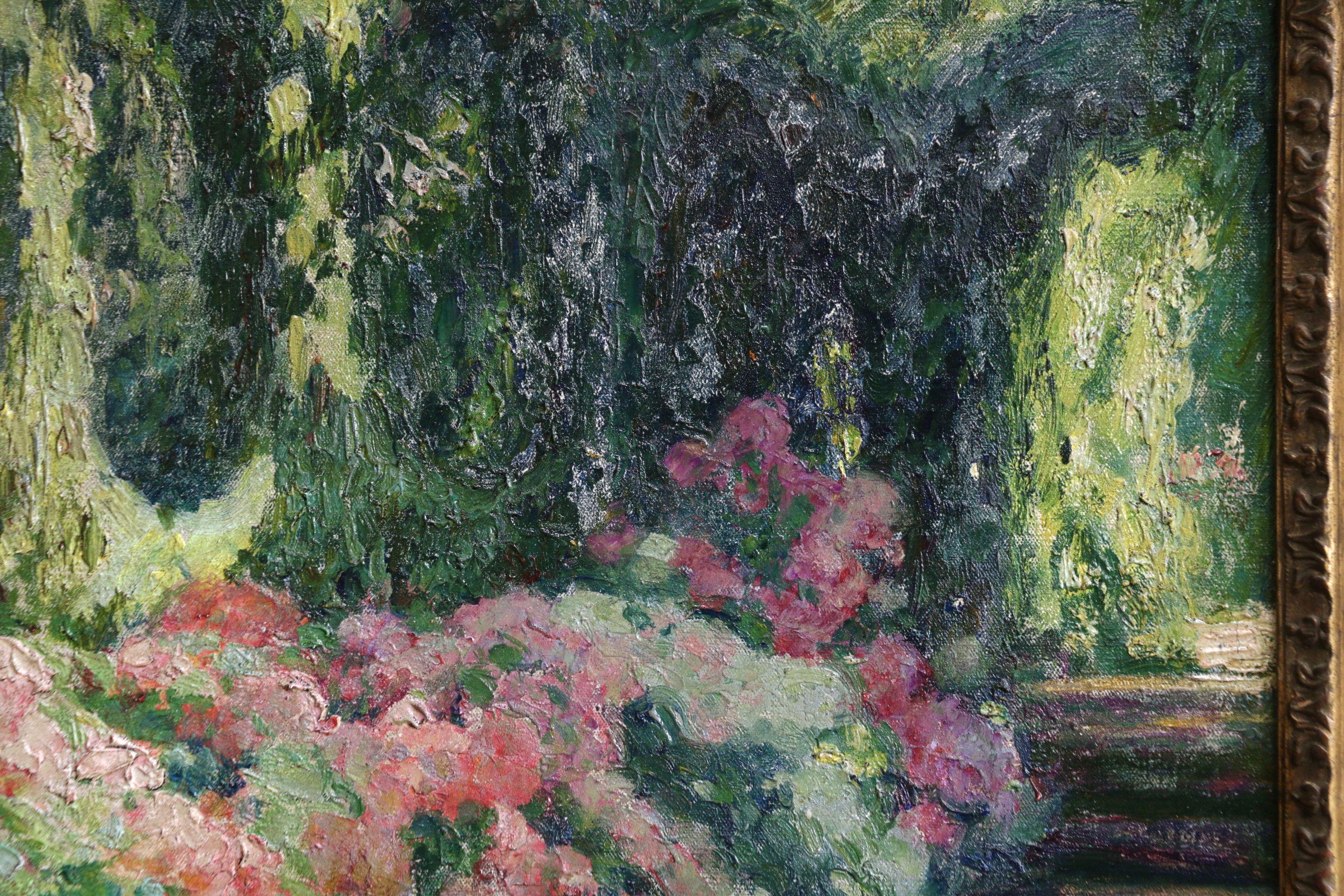 A wonderful and beautifully coloured oil on original canvas by Octave Guillonnet depicting a garden in bloom. Signed and dated 1924 lower right. Framed dimensions are 22 inches high by 19 inches wide.

Émile Guillonnet was a student of Lionel Royer