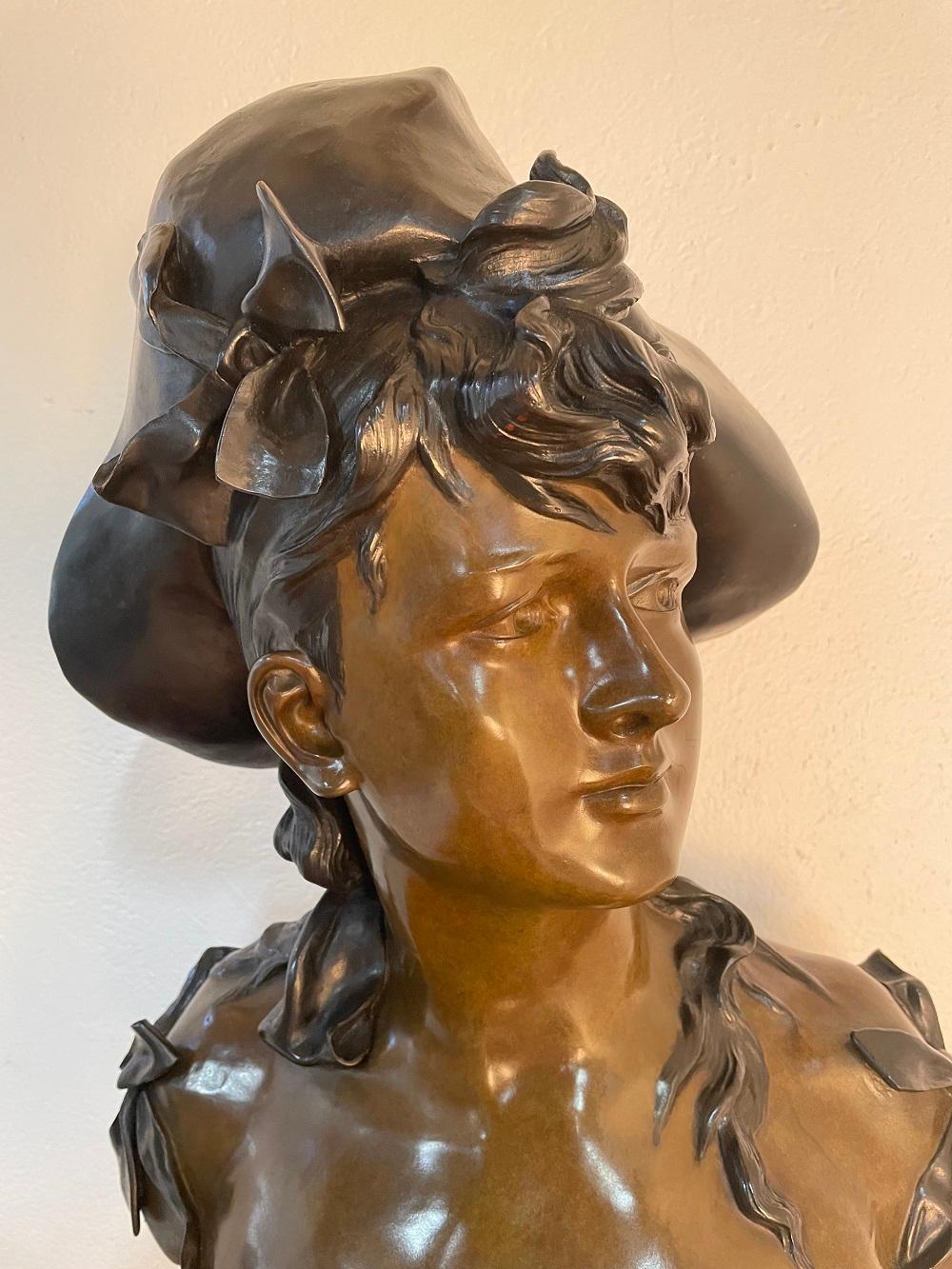 Emile Pinedo bronze bust sculpture of a woman.